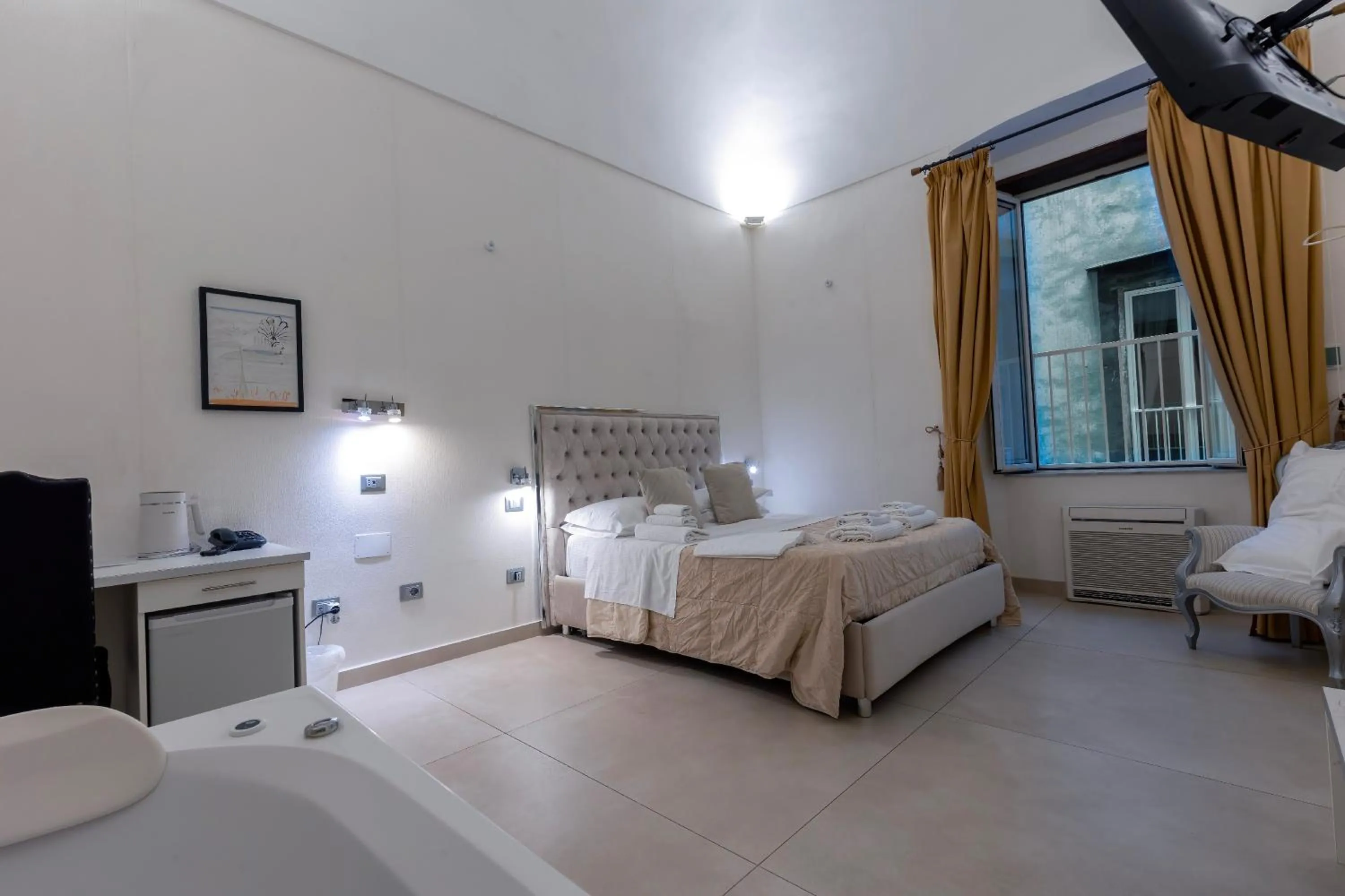 Bed in Il Tesoro Smart Suite & SPA