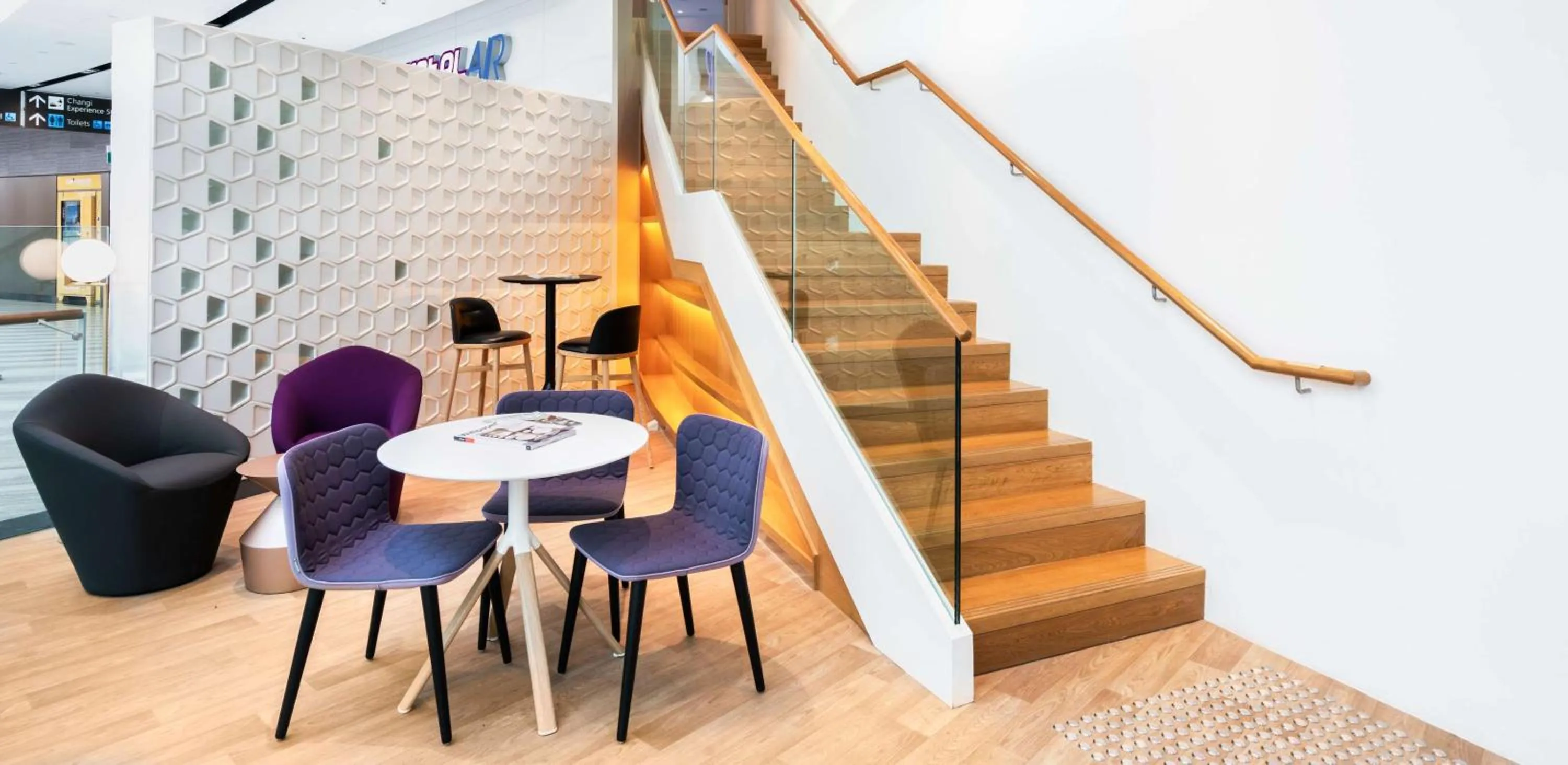 Communal lounge/ TV room in YOTELAIR Singapore Changi Airport Landside