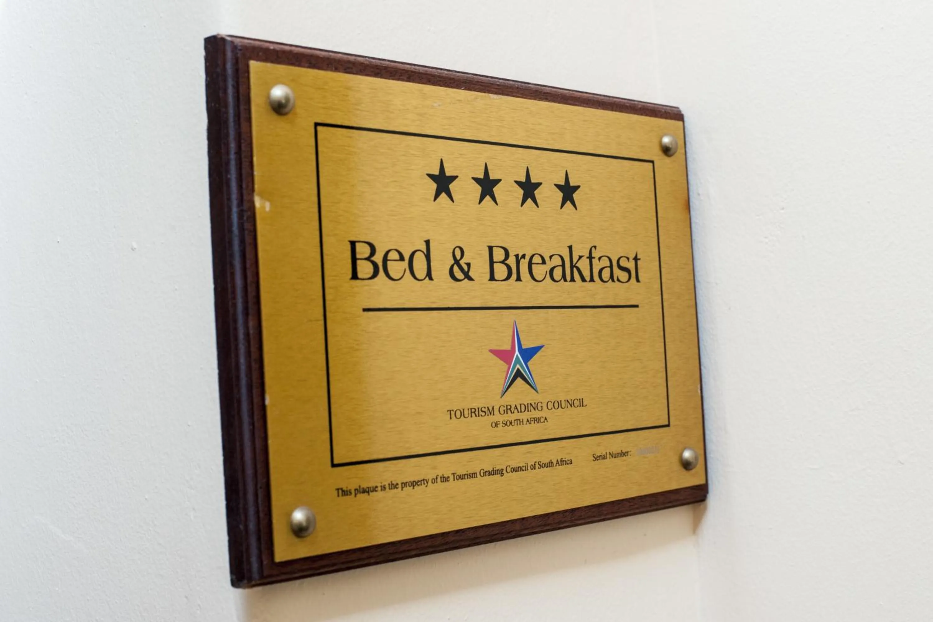 Decorative detail, Bed in Bayside Lodge Garden Route B&B