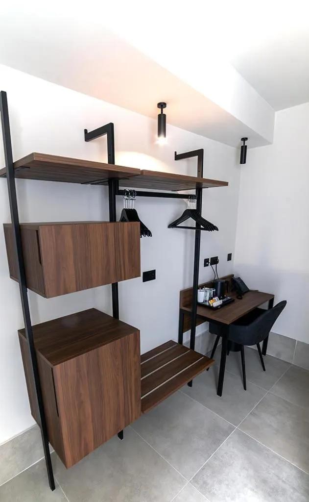 Bed in Onyx Suites & Apartments