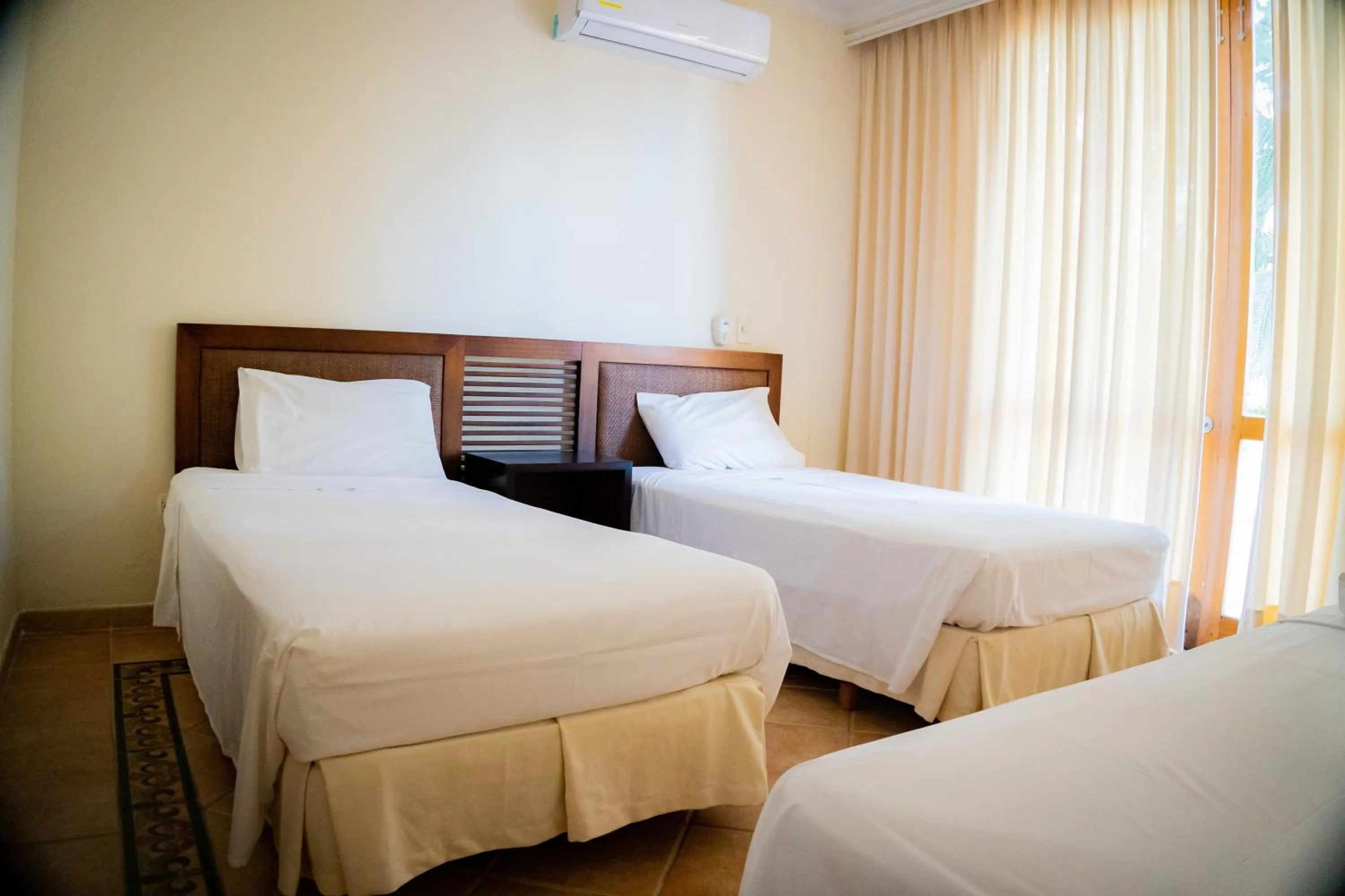 Bed in Hotel Peñon Suites