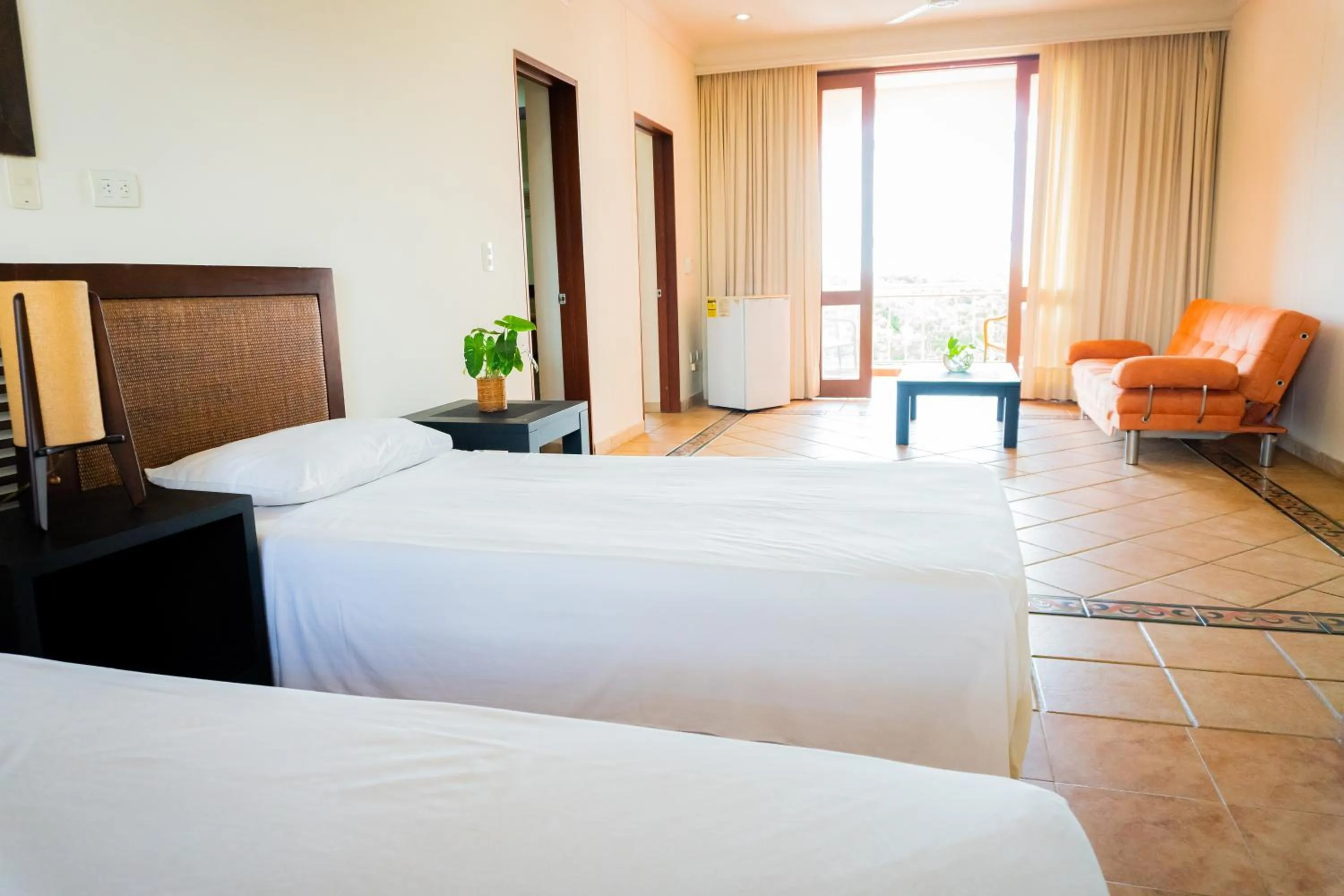 Bed in Hotel Peñon Suites