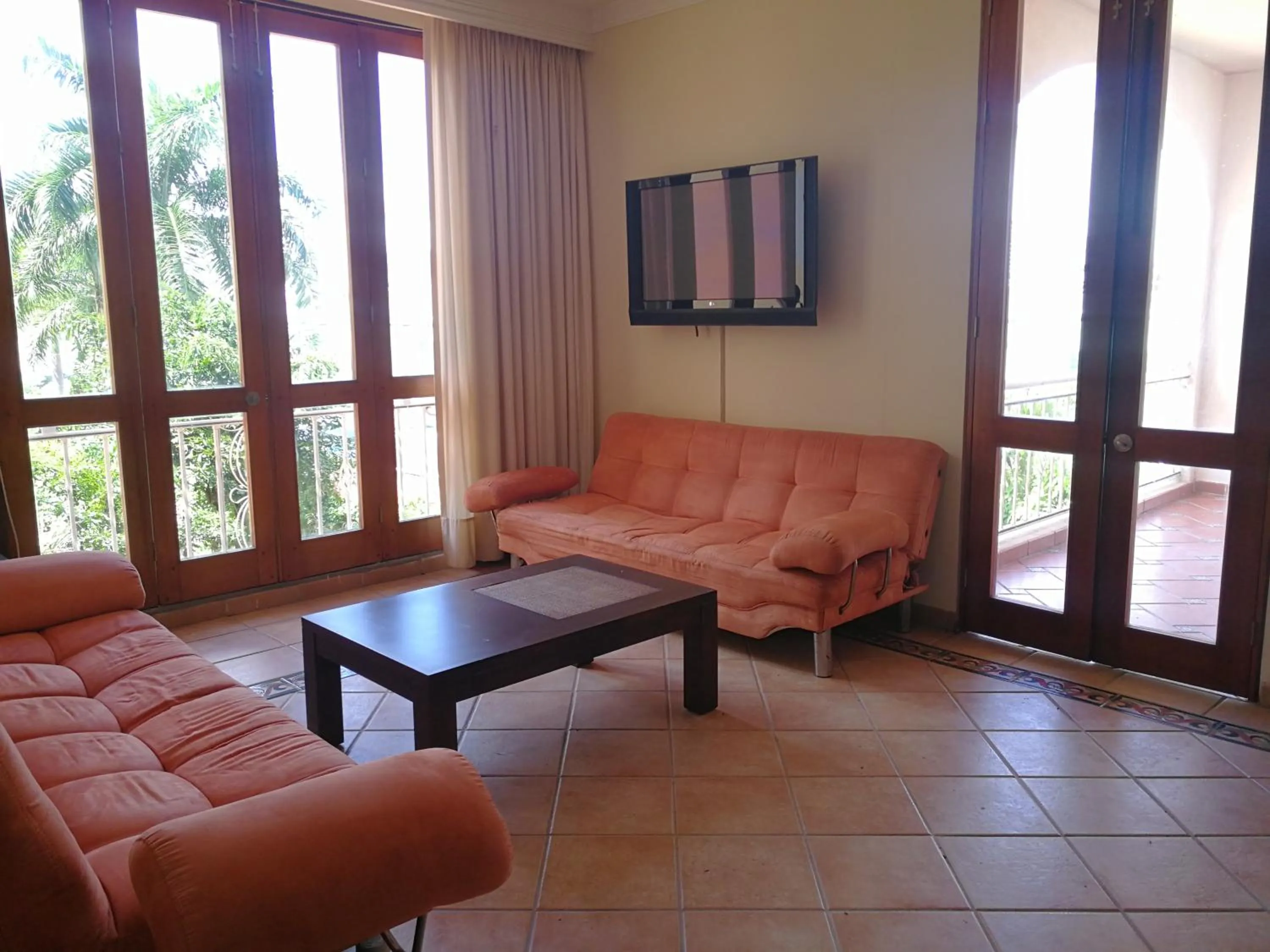 Living room in Hotel Peñon Suites