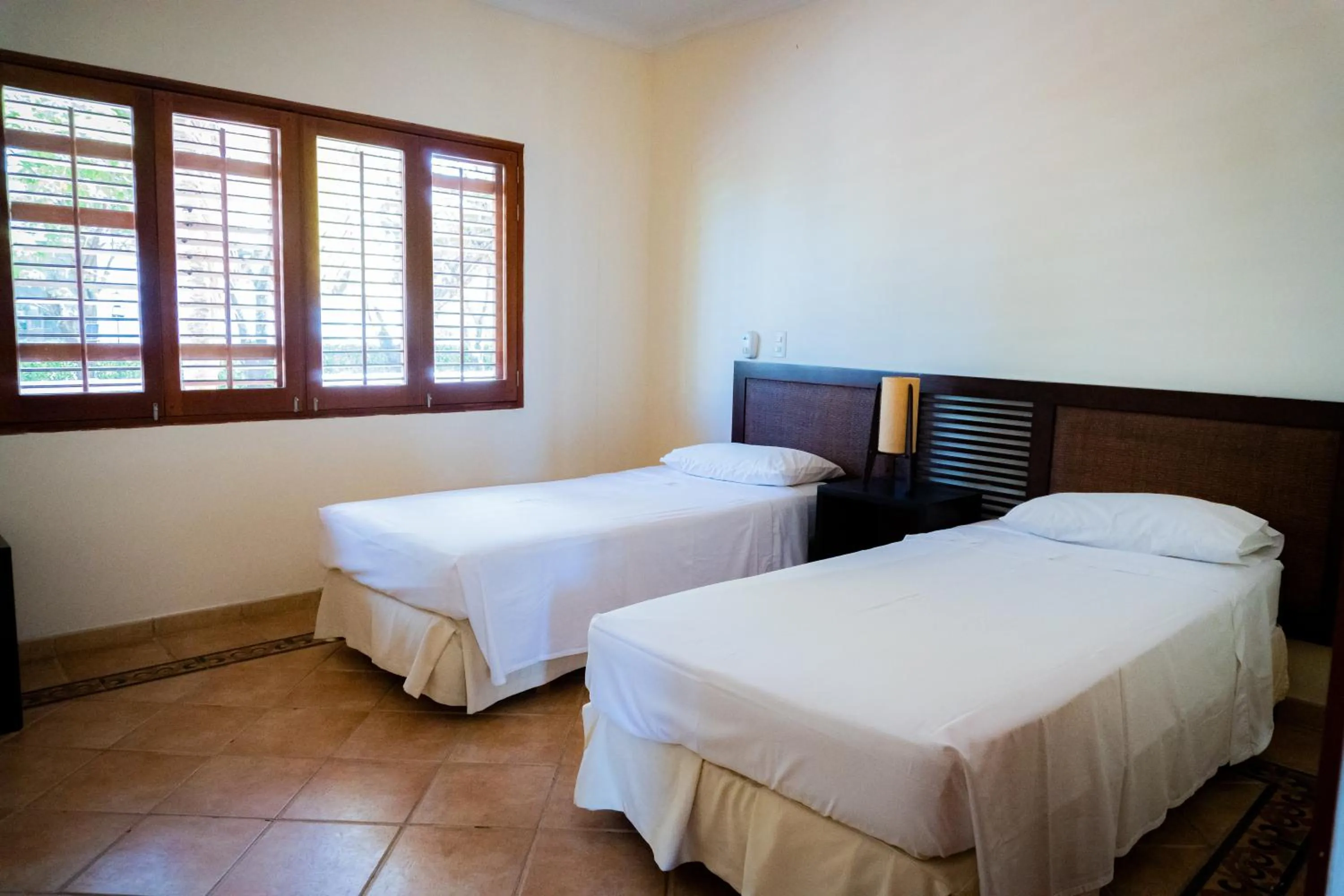 Bed in Hotel Peñon Suites