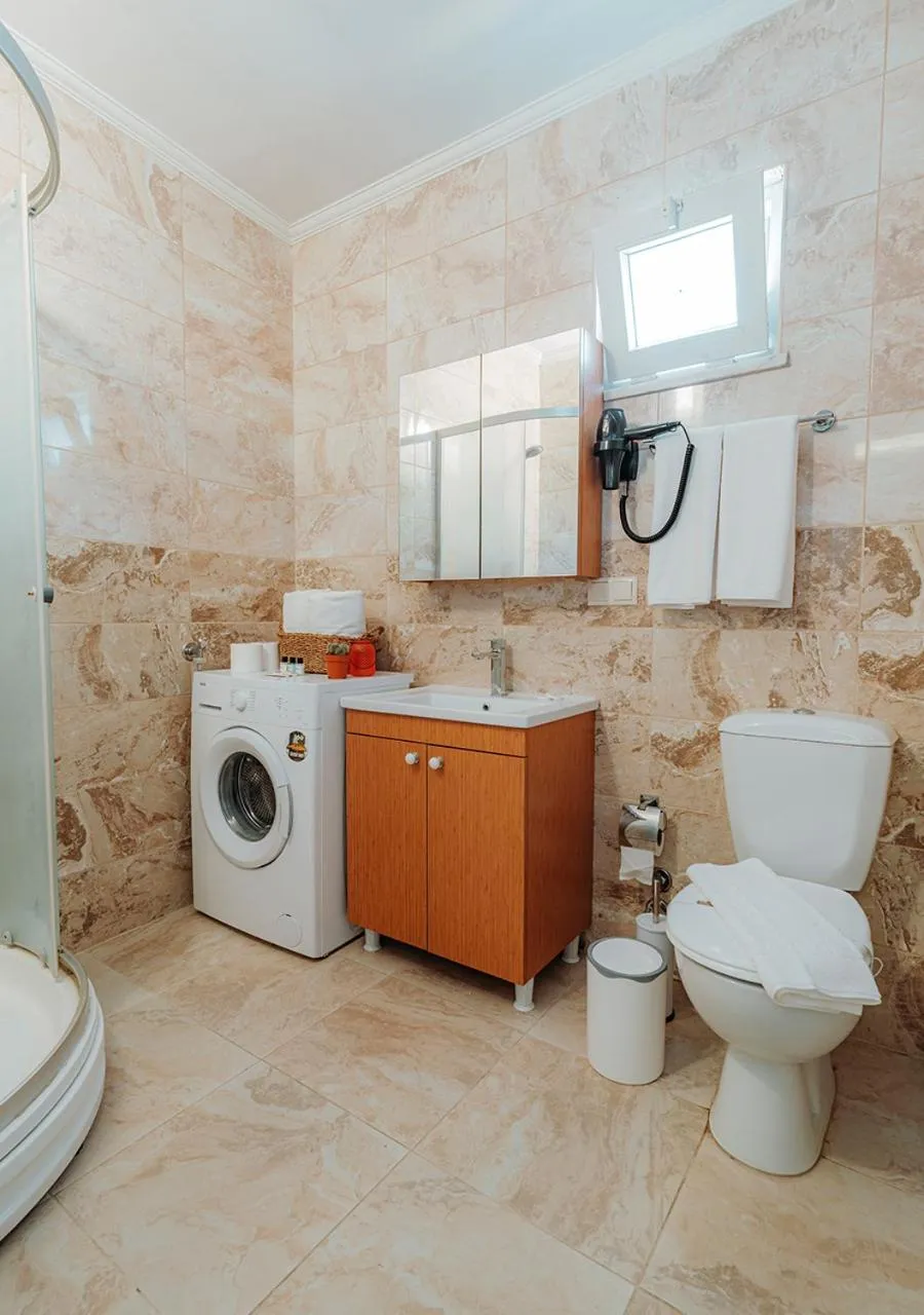 Toilet in Umut Apartments