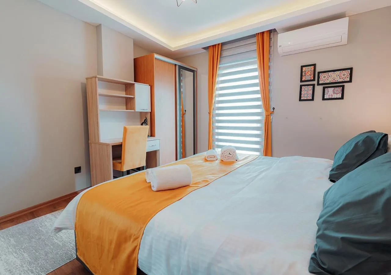 Bed in Umut Apartments