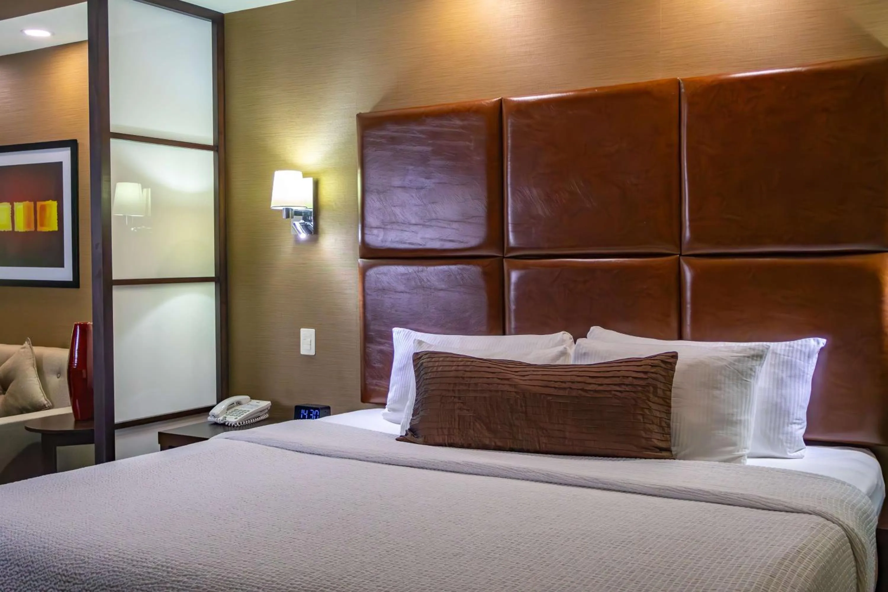 Photo of the whole room, Bed in Best Western PREMIER Monterrey Aeropuerto
