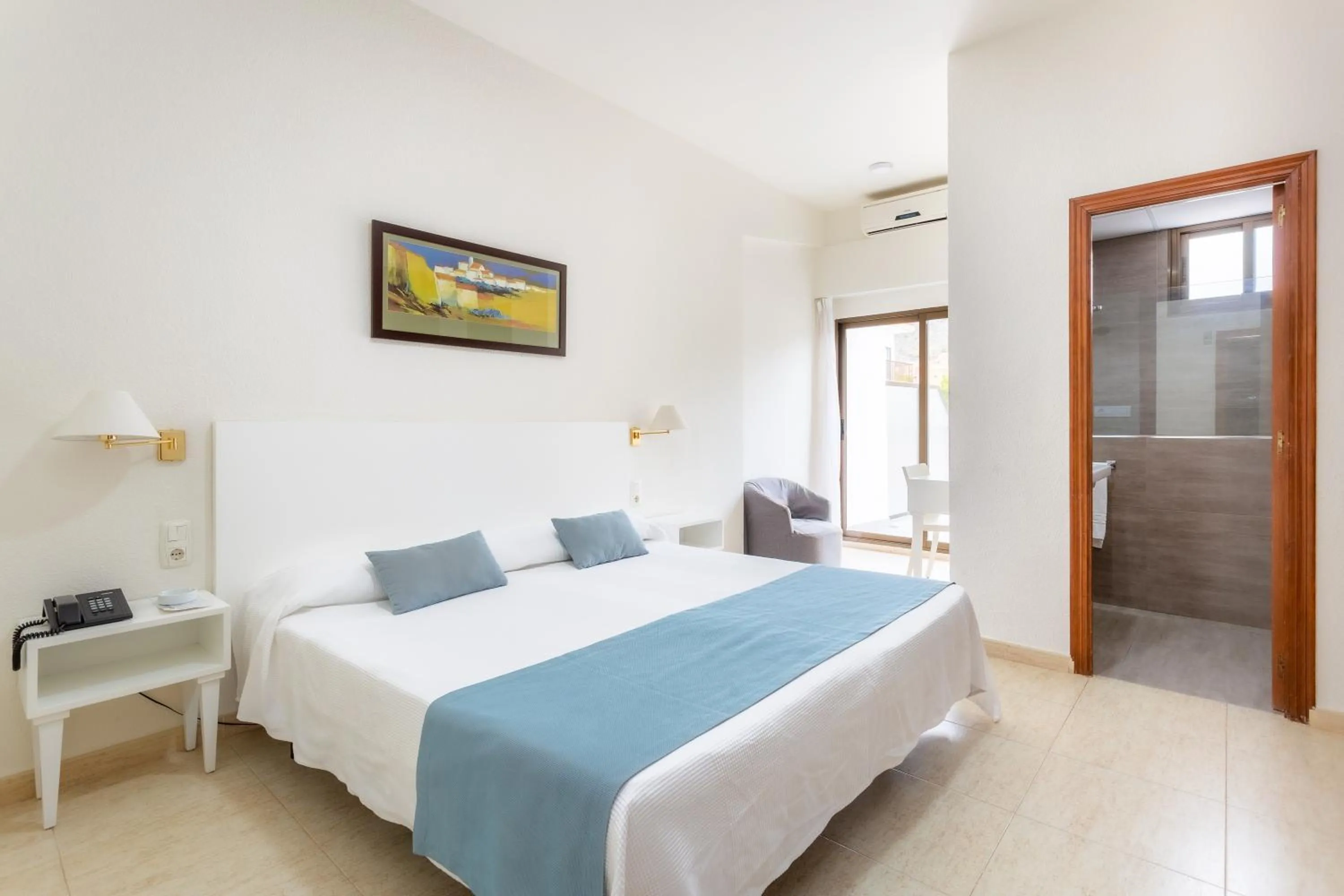 Bed in Hotel Sicania