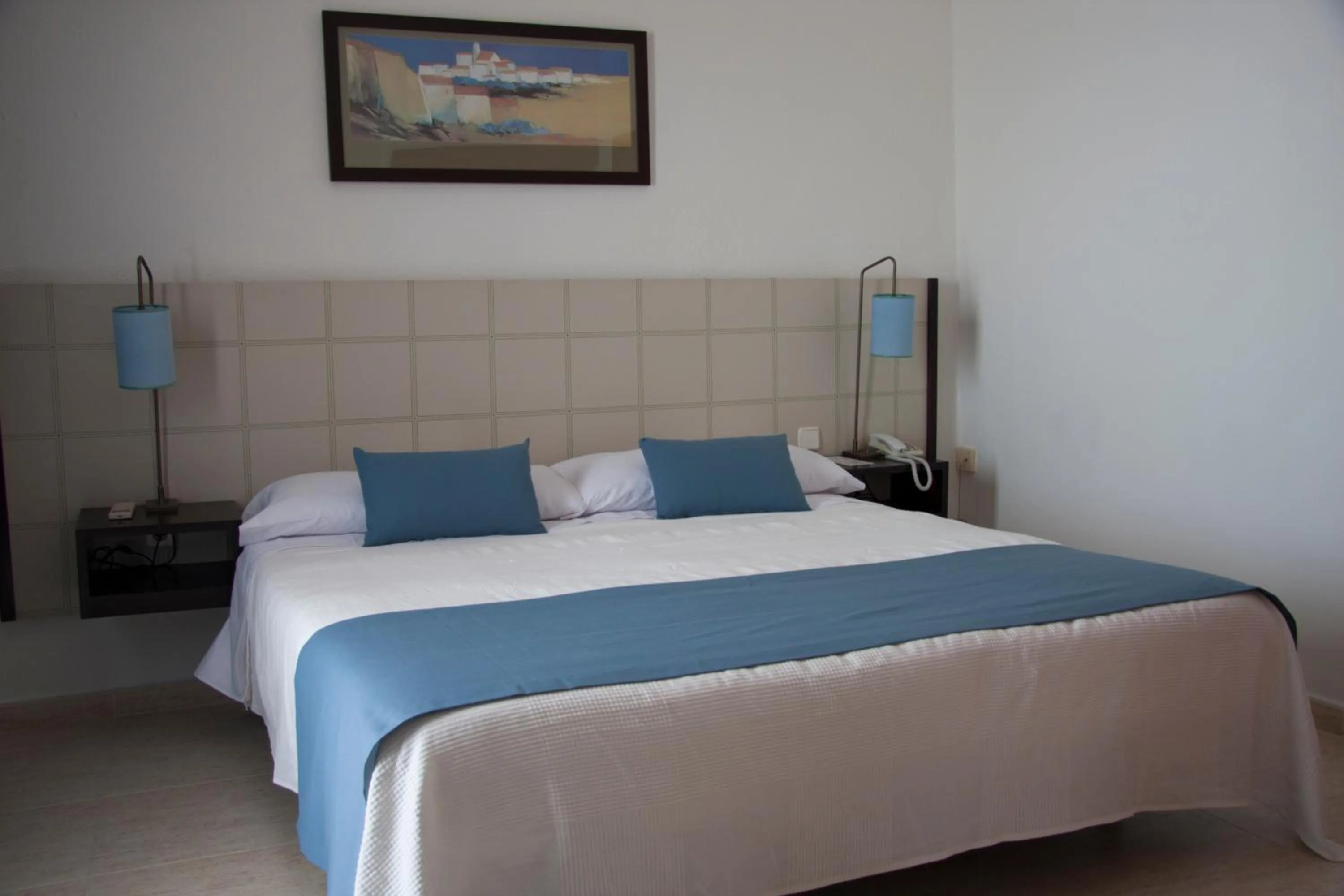 Bed in Hotel Sicania