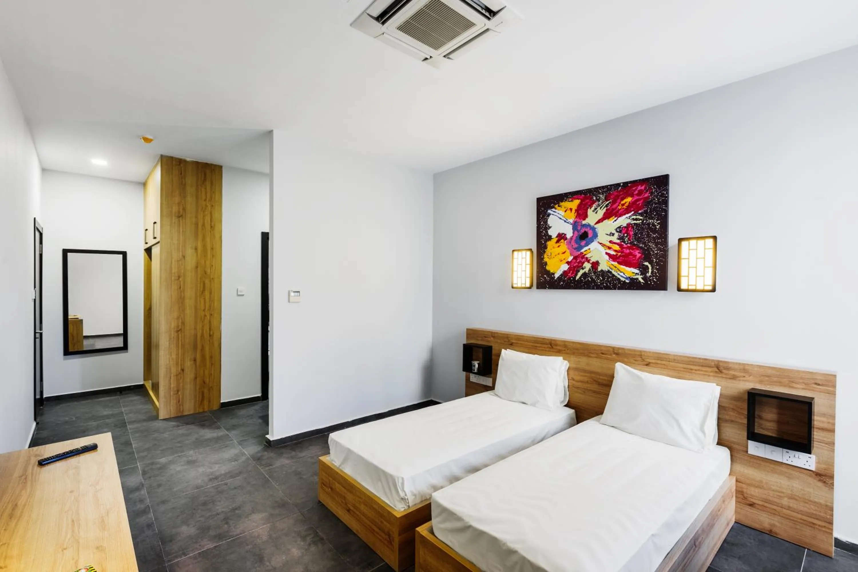 Bed in G Suites Luxury Rentals