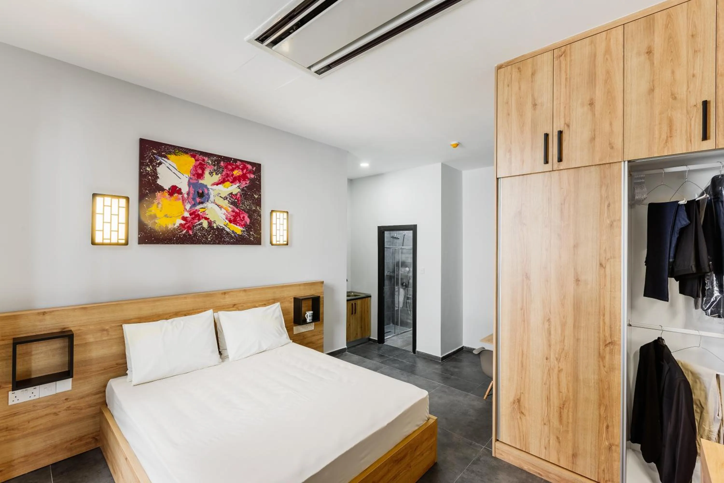 Bed in G Suites Luxury Rentals