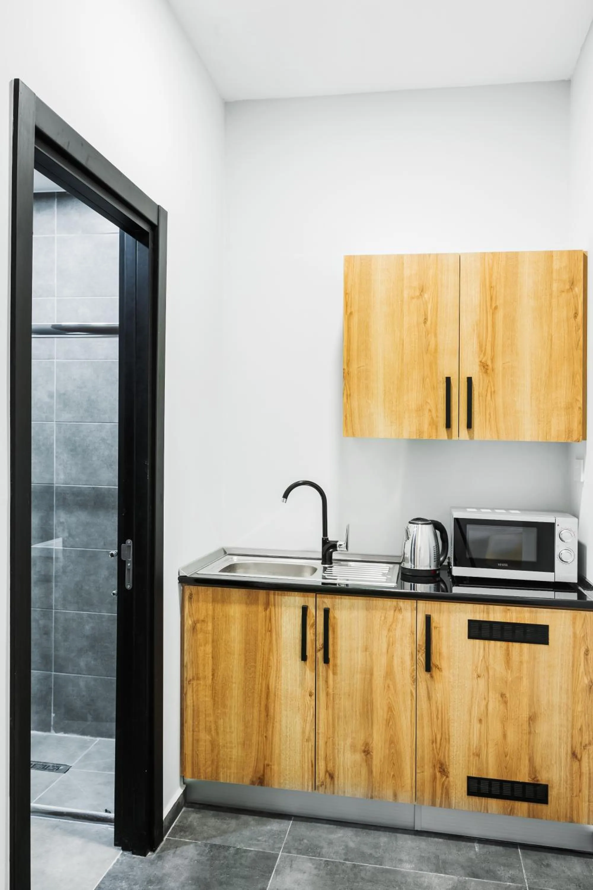 Kitchen or kitchenette in G Suites Luxury Rentals