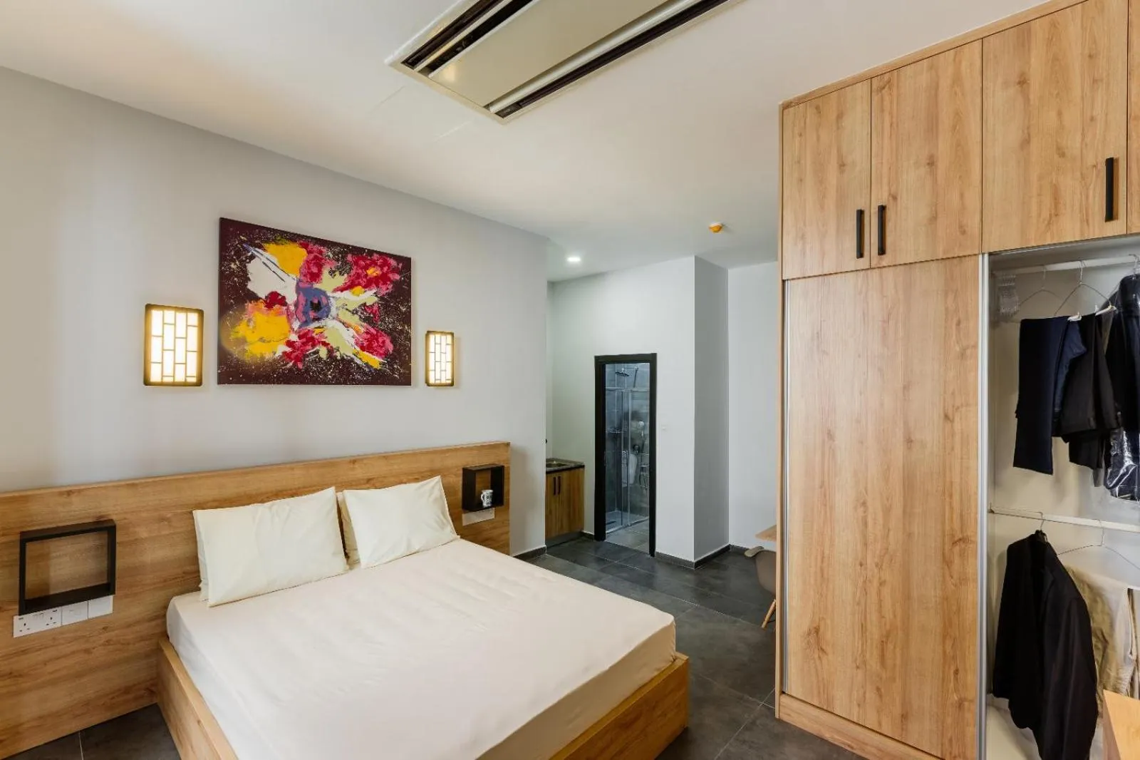 Bed in G Suites Luxury Rentals