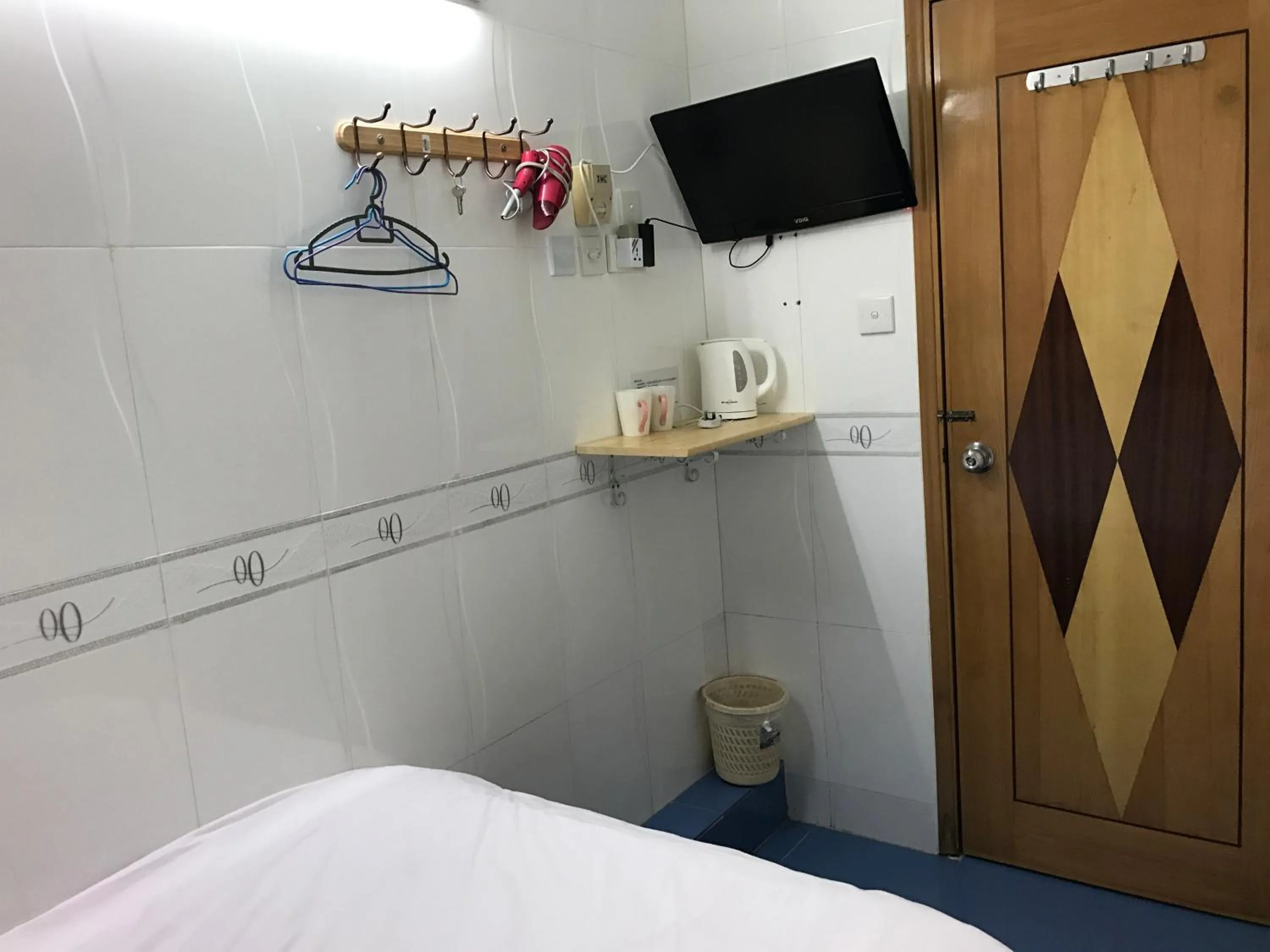 Decorative detail, Bed in Beverly Guest House