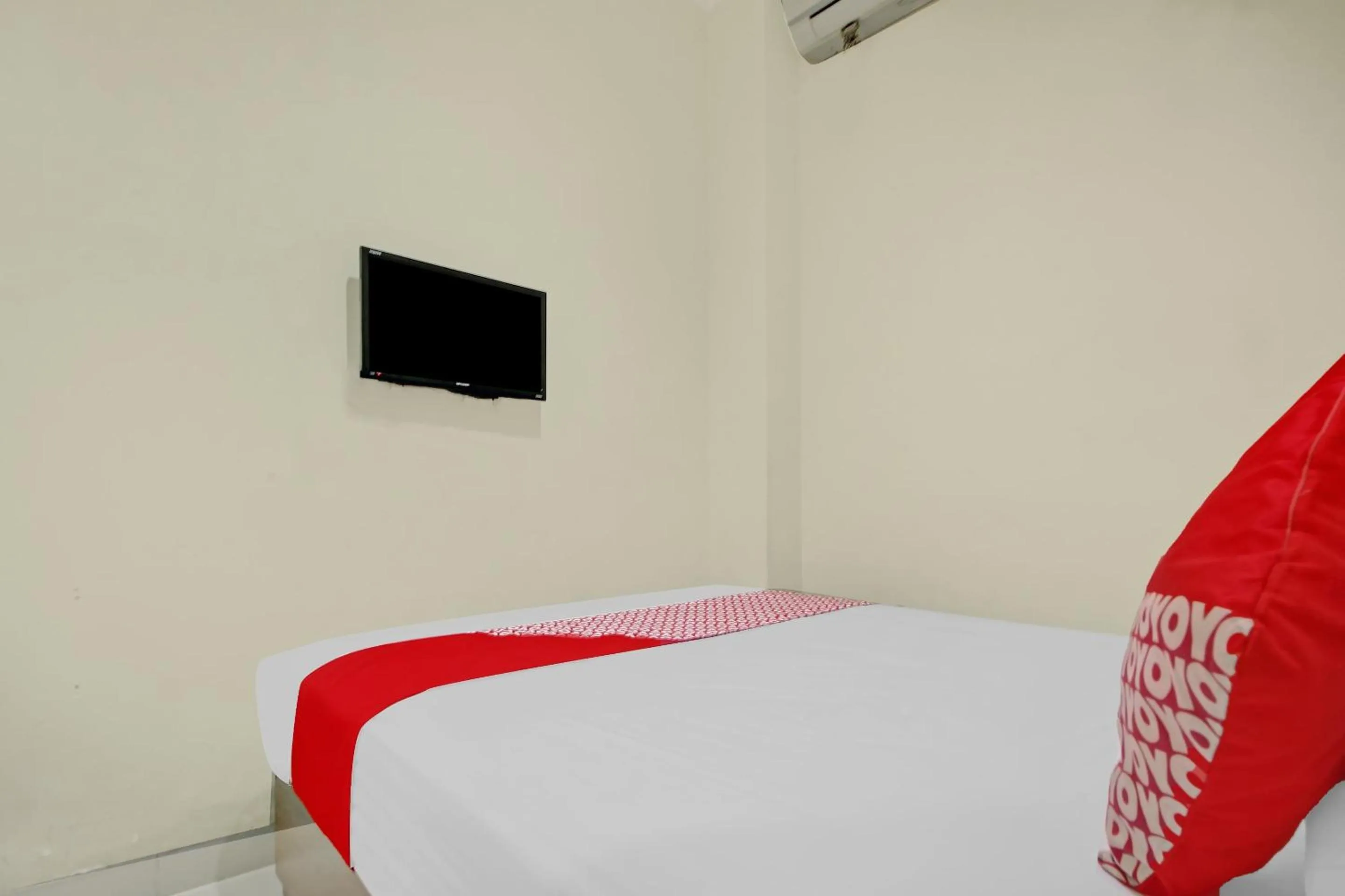 Bedroom in OYO 90412 My Kost