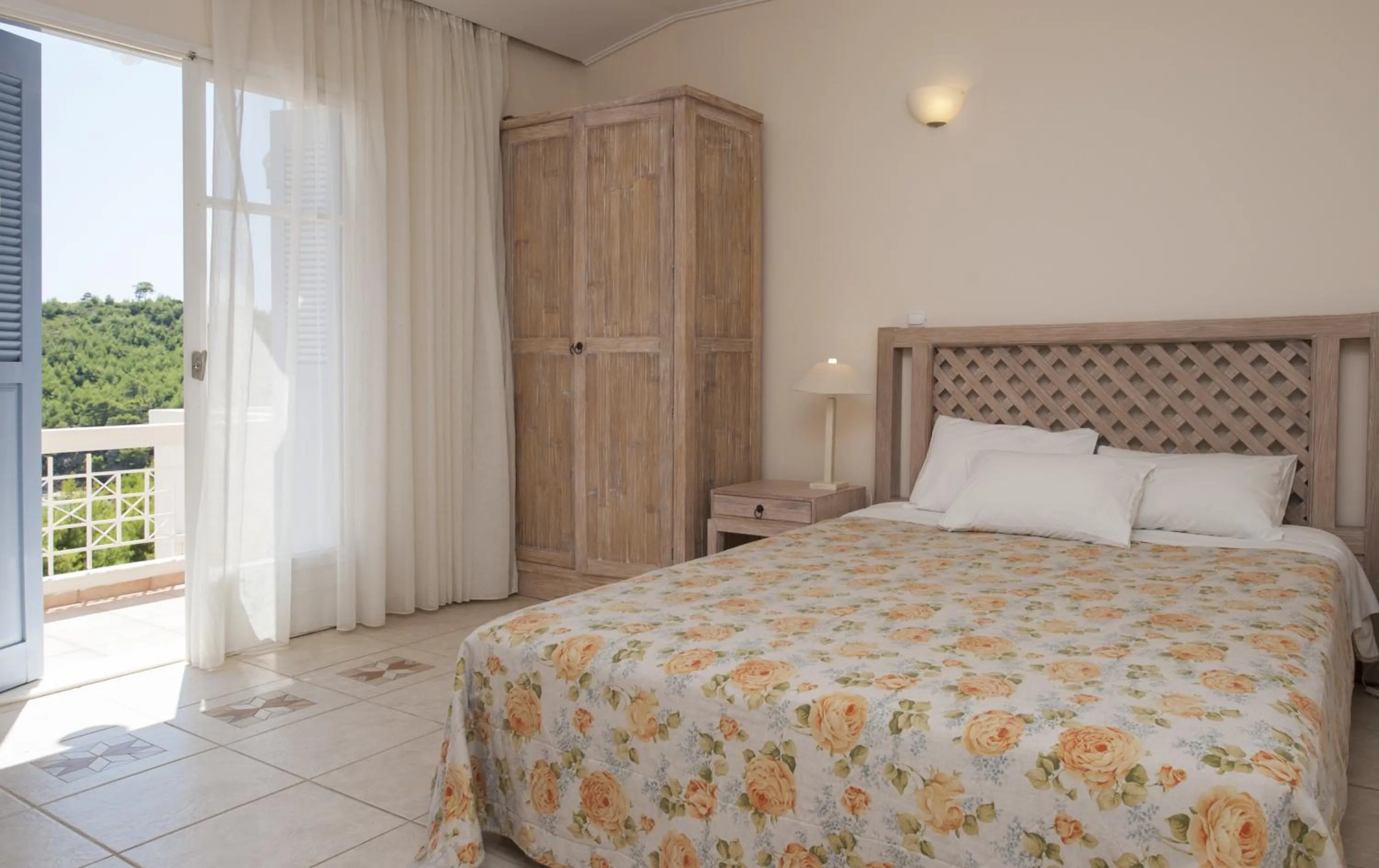 Bedroom, Bed in Alonissos Beach Bungalows And Suites Hotel