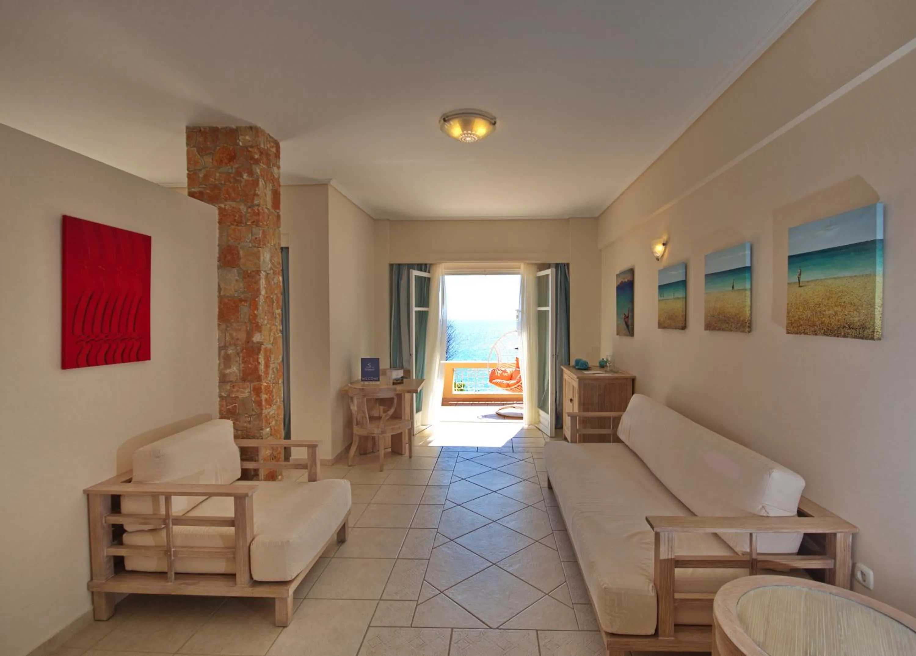 Living room in Alonissos Beach Bungalows And Suites Hotel