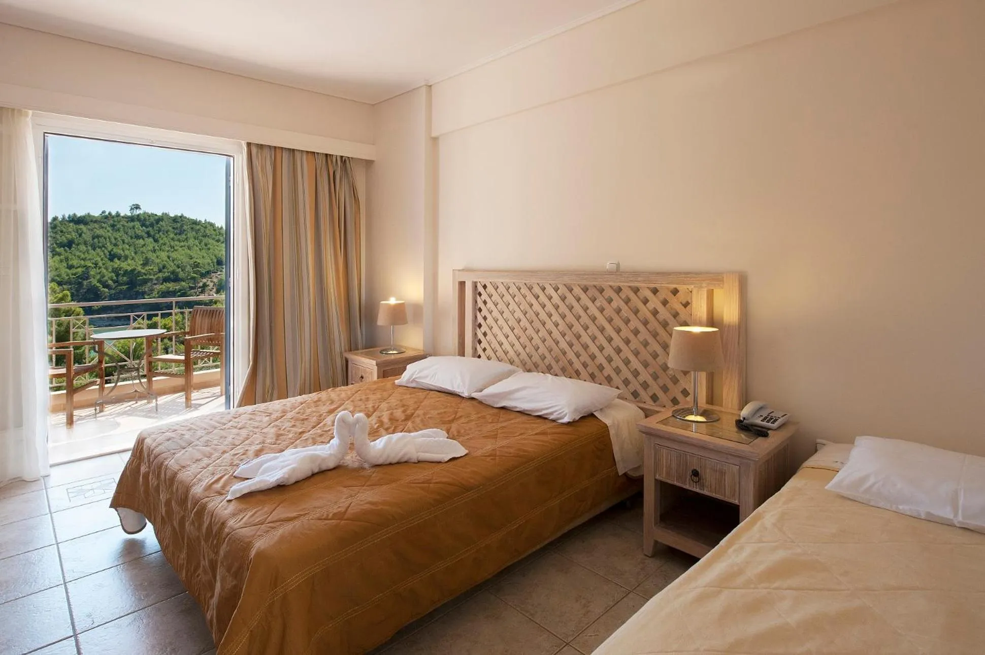 Bedroom, Bed in Alonissos Beach Bungalows And Suites Hotel