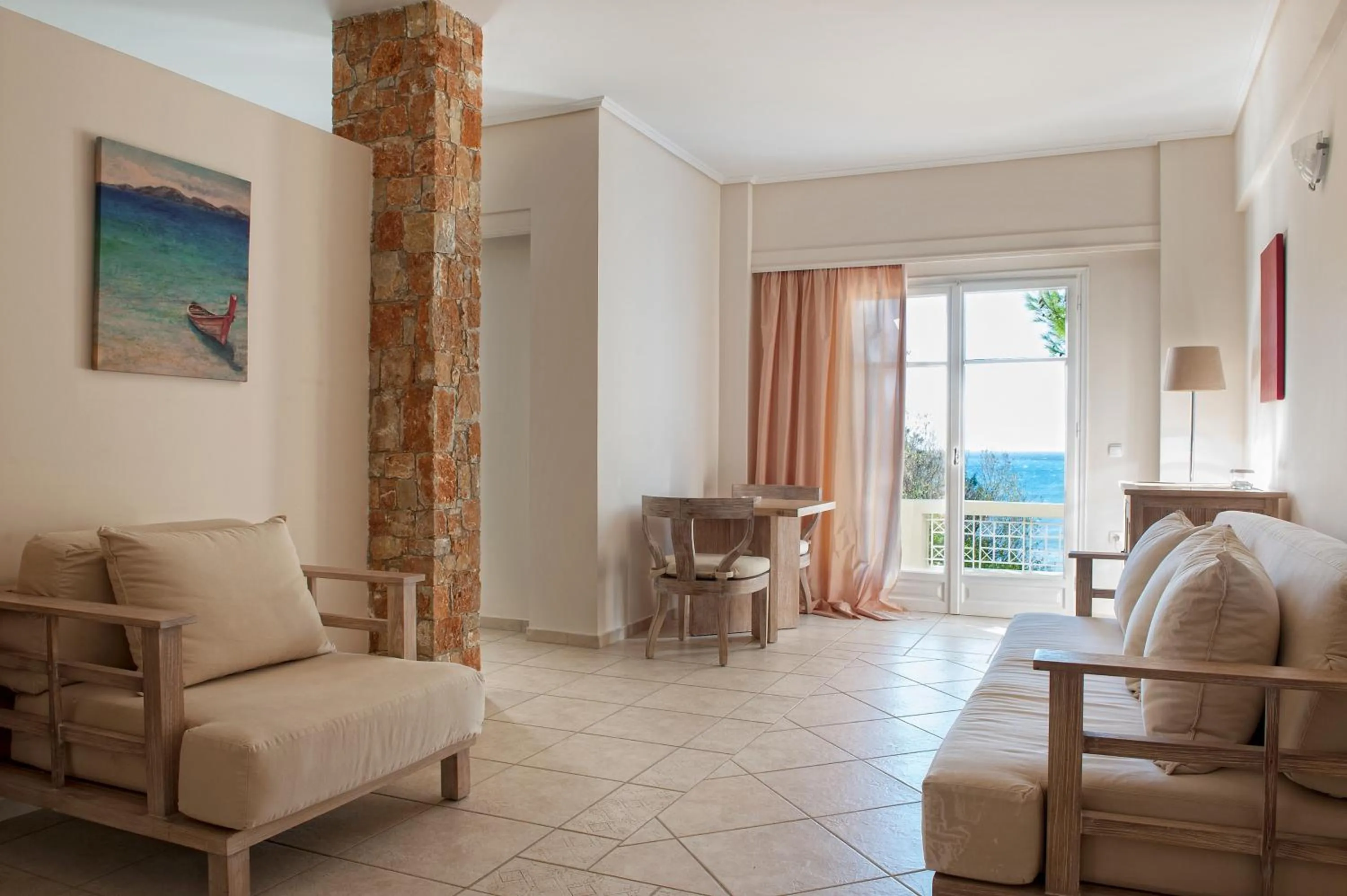 Living room in Alonissos Beach Bungalows And Suites Hotel