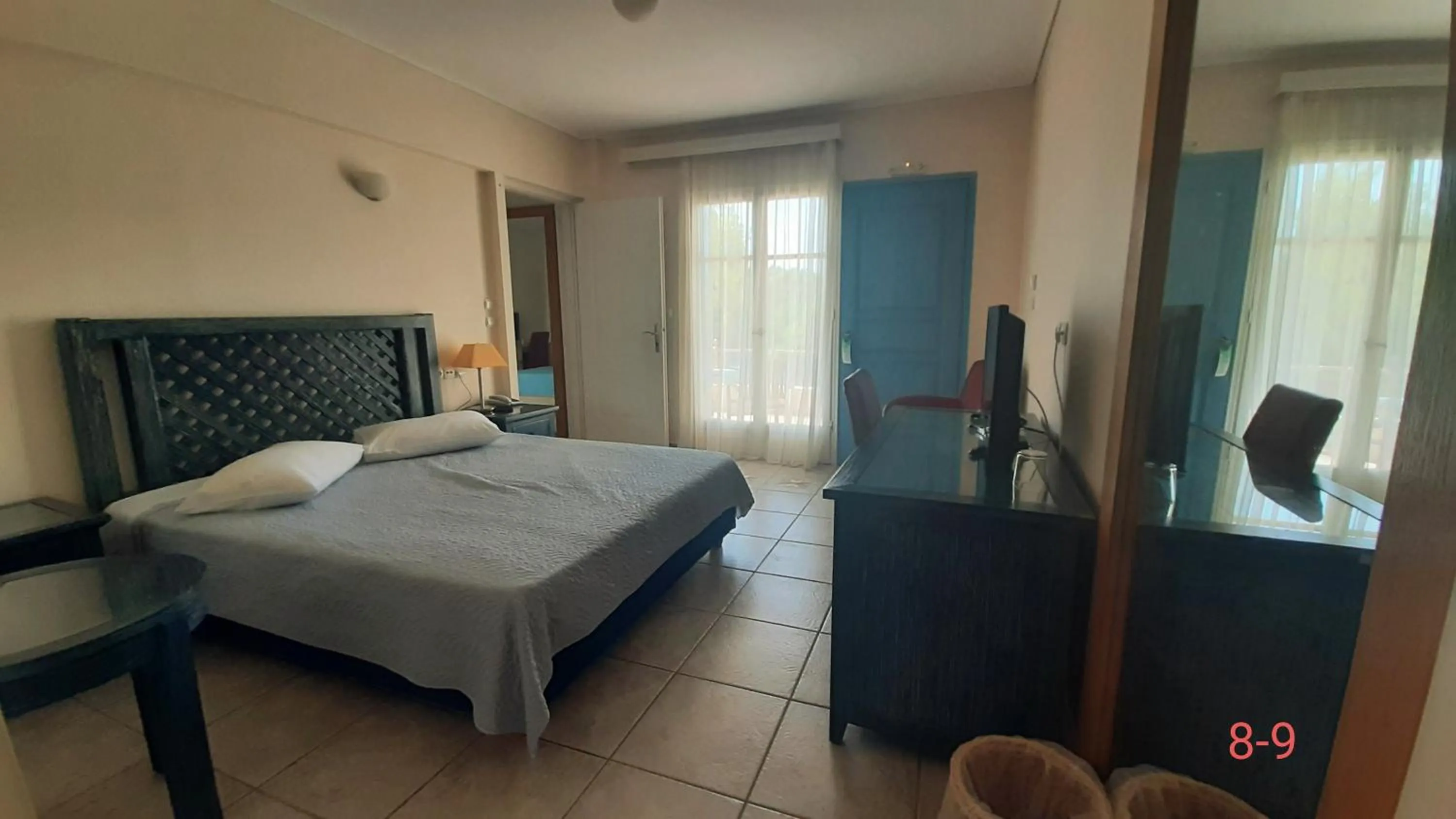 Bedroom, Bed in Alonissos Beach Bungalows And Suites Hotel