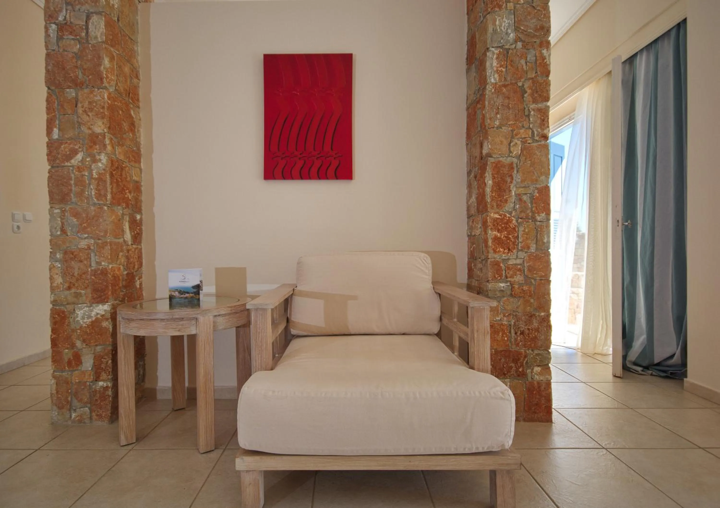 Living room in Alonissos Beach Bungalows And Suites Hotel