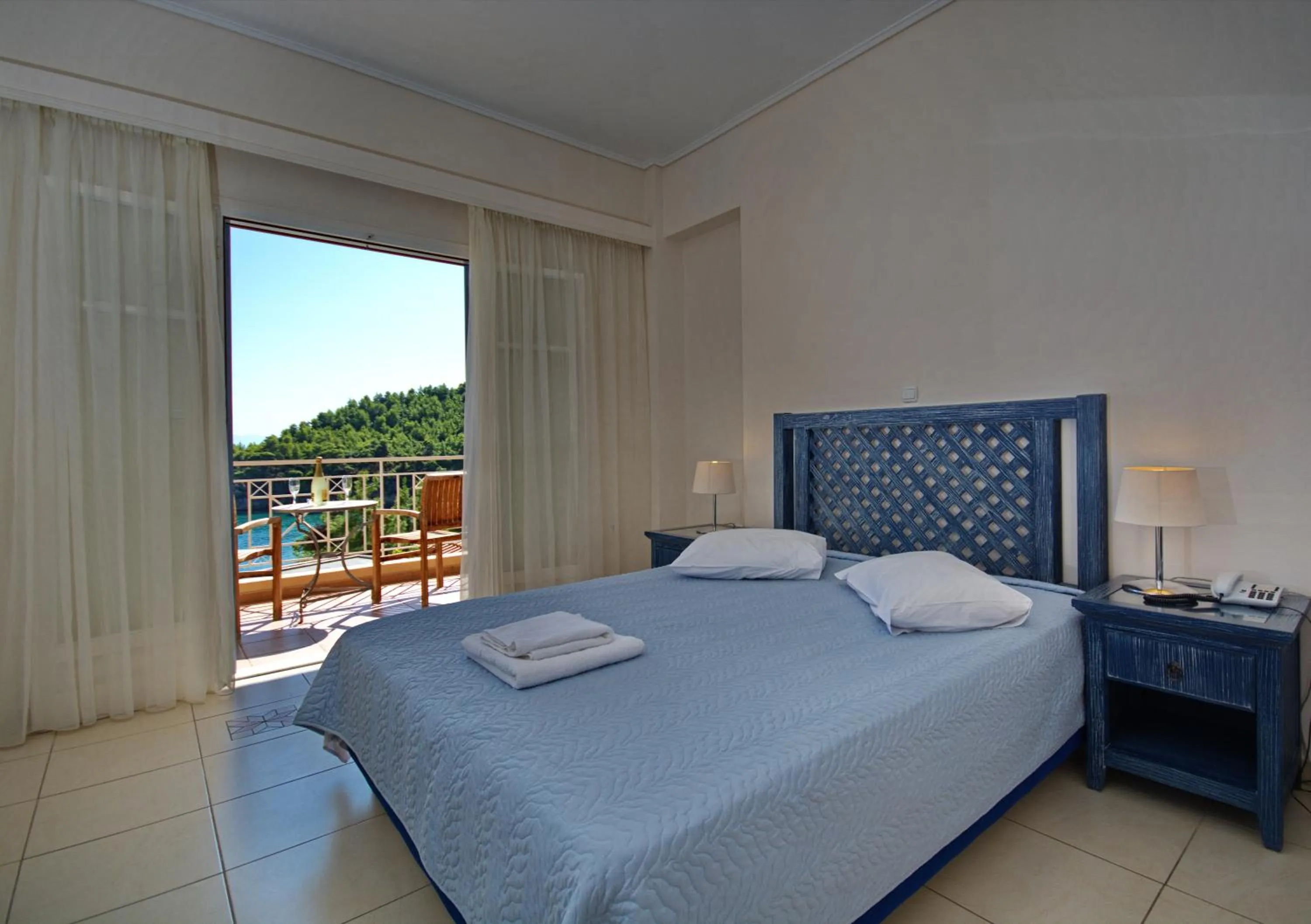 Bedroom, Bed in Alonissos Beach Bungalows And Suites Hotel