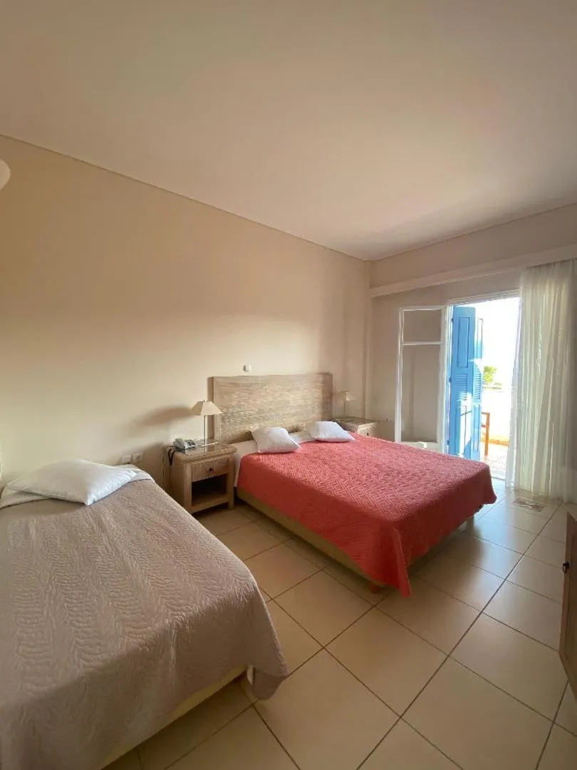 Bedroom, Bed in Alonissos Beach Bungalows And Suites Hotel