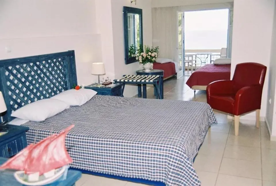 Bedroom, Bed in Alonissos Beach Bungalows And Suites Hotel