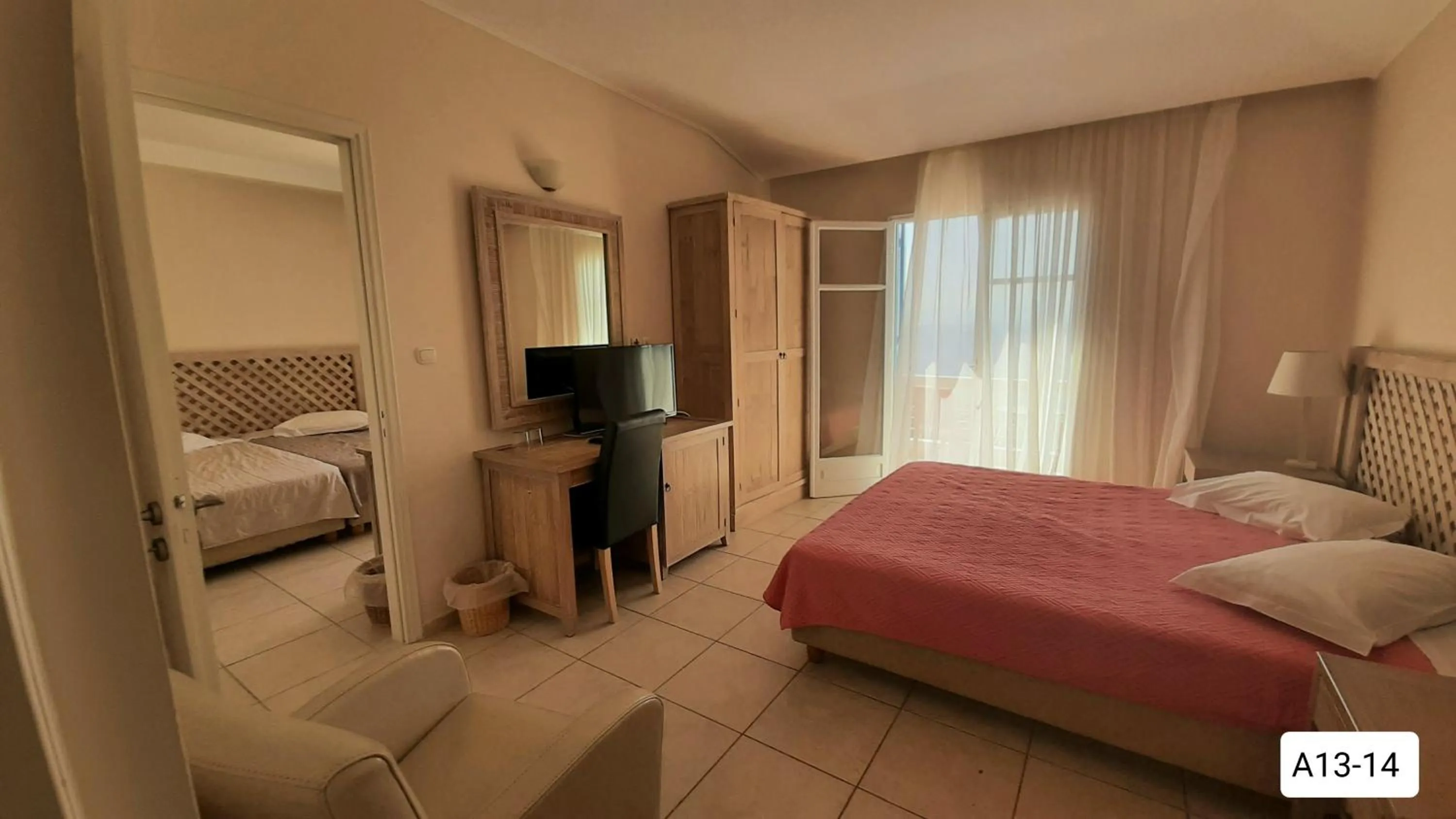 Bedroom, Bed in Alonissos Beach Bungalows And Suites Hotel