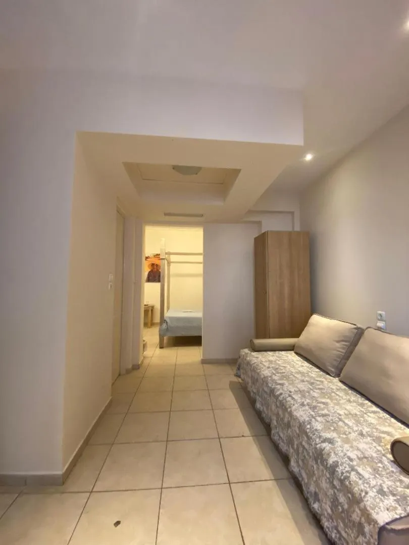 Bedroom, Bed in Alonissos Beach Bungalows And Suites Hotel