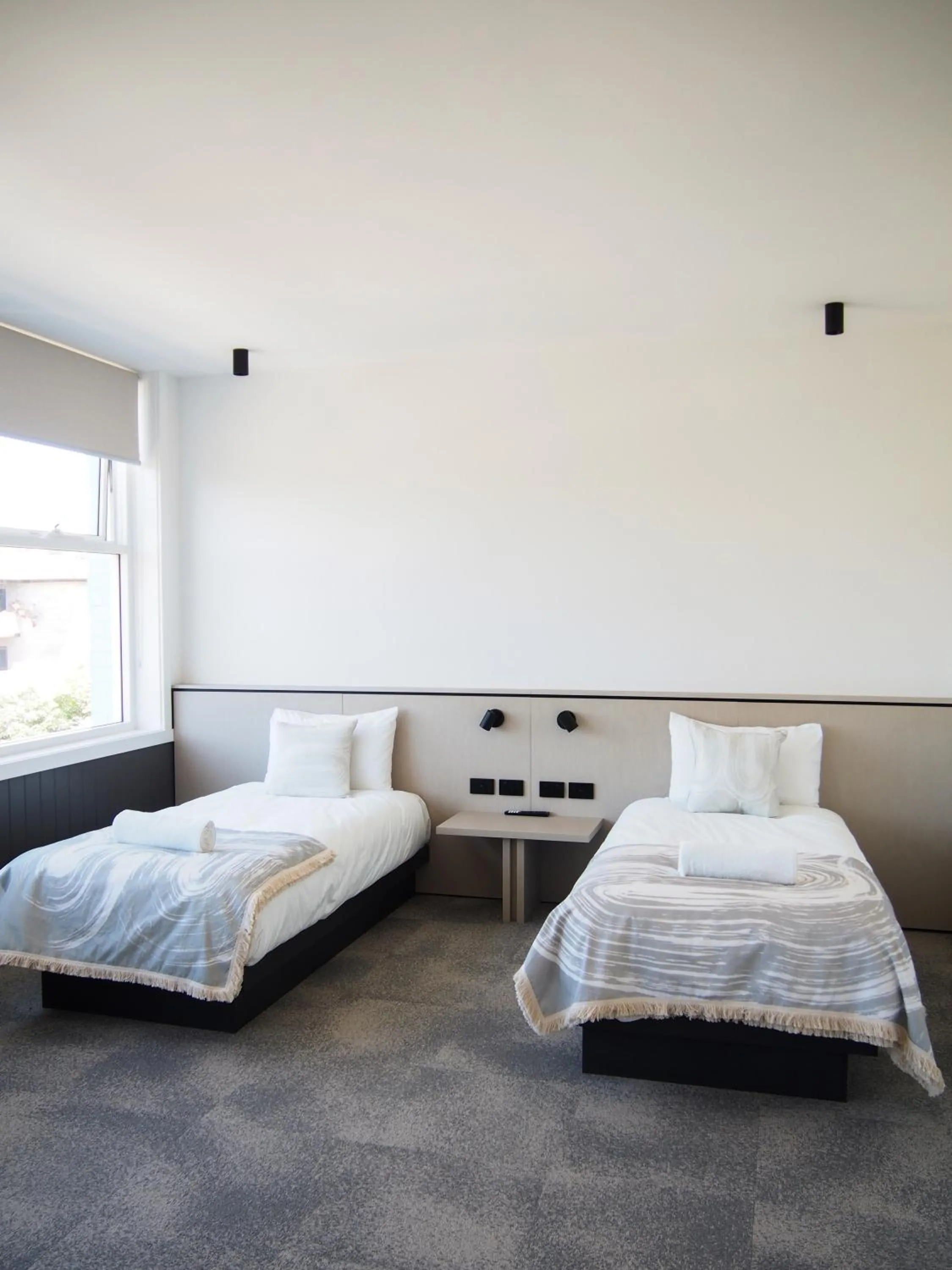 Bed in Barrys Beach Road Hotel