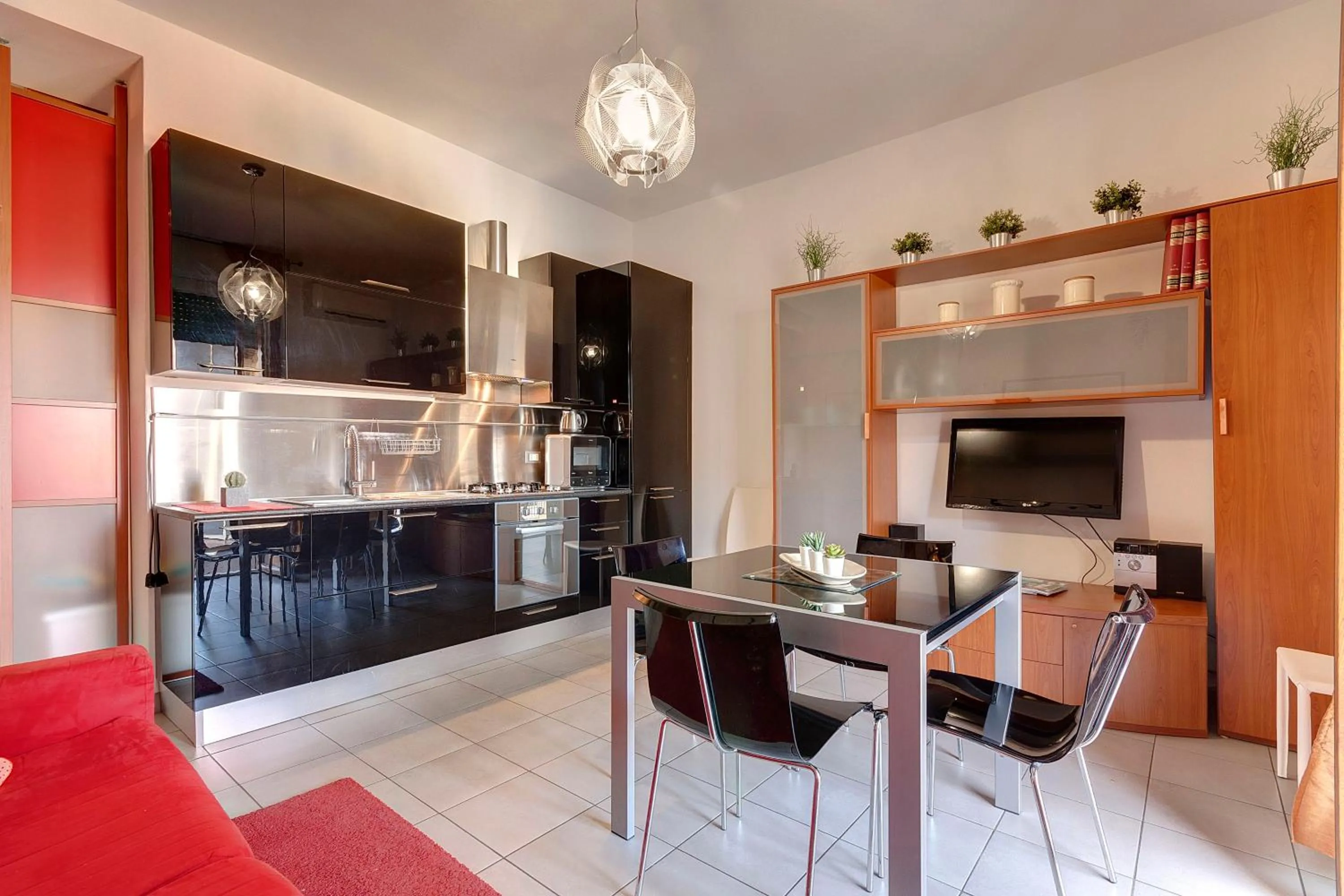 Kitchen or kitchenette in Binario9 Terrace Apartment by Mamo Florence