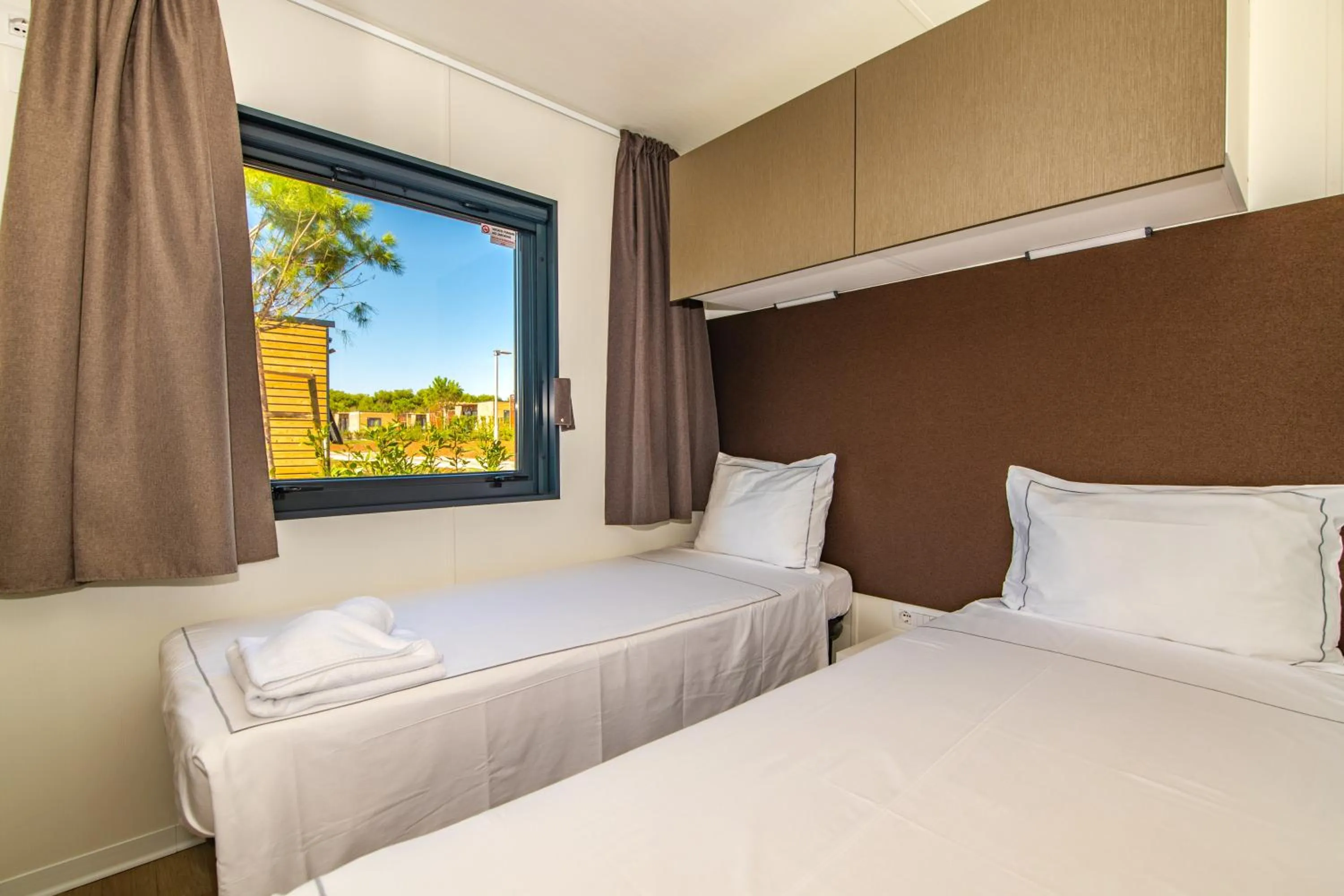 Bed in Arena Grand Kazela Camping Homes