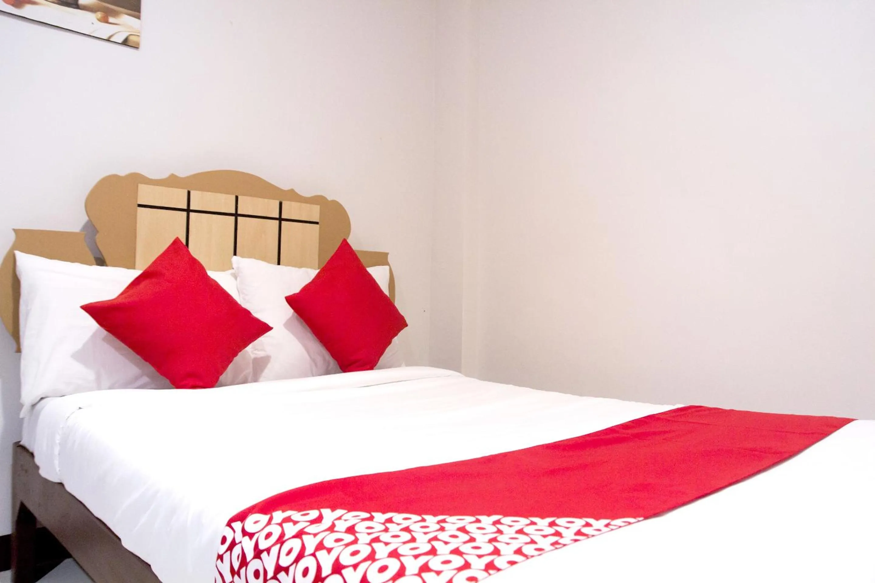 Bedroom in OYO 153 Espacio de Clarita Hometel