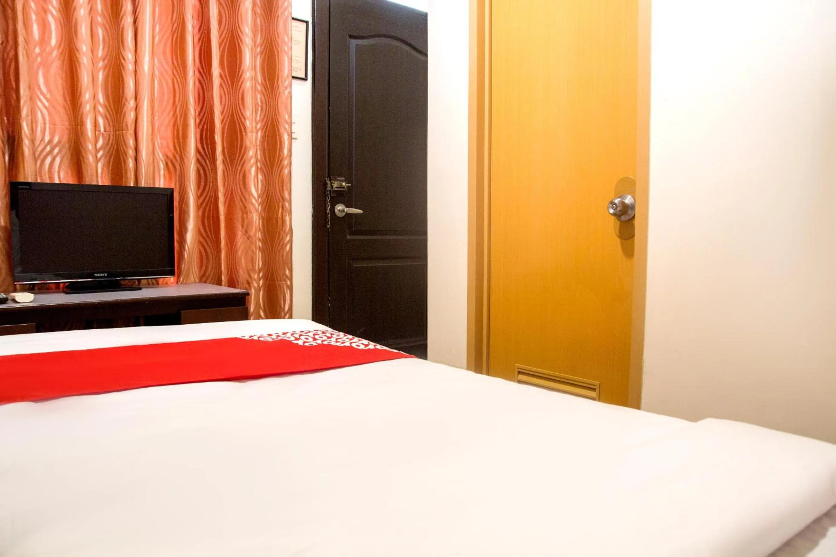 Bedroom in OYO 153 Espacio de Clarita Hometel