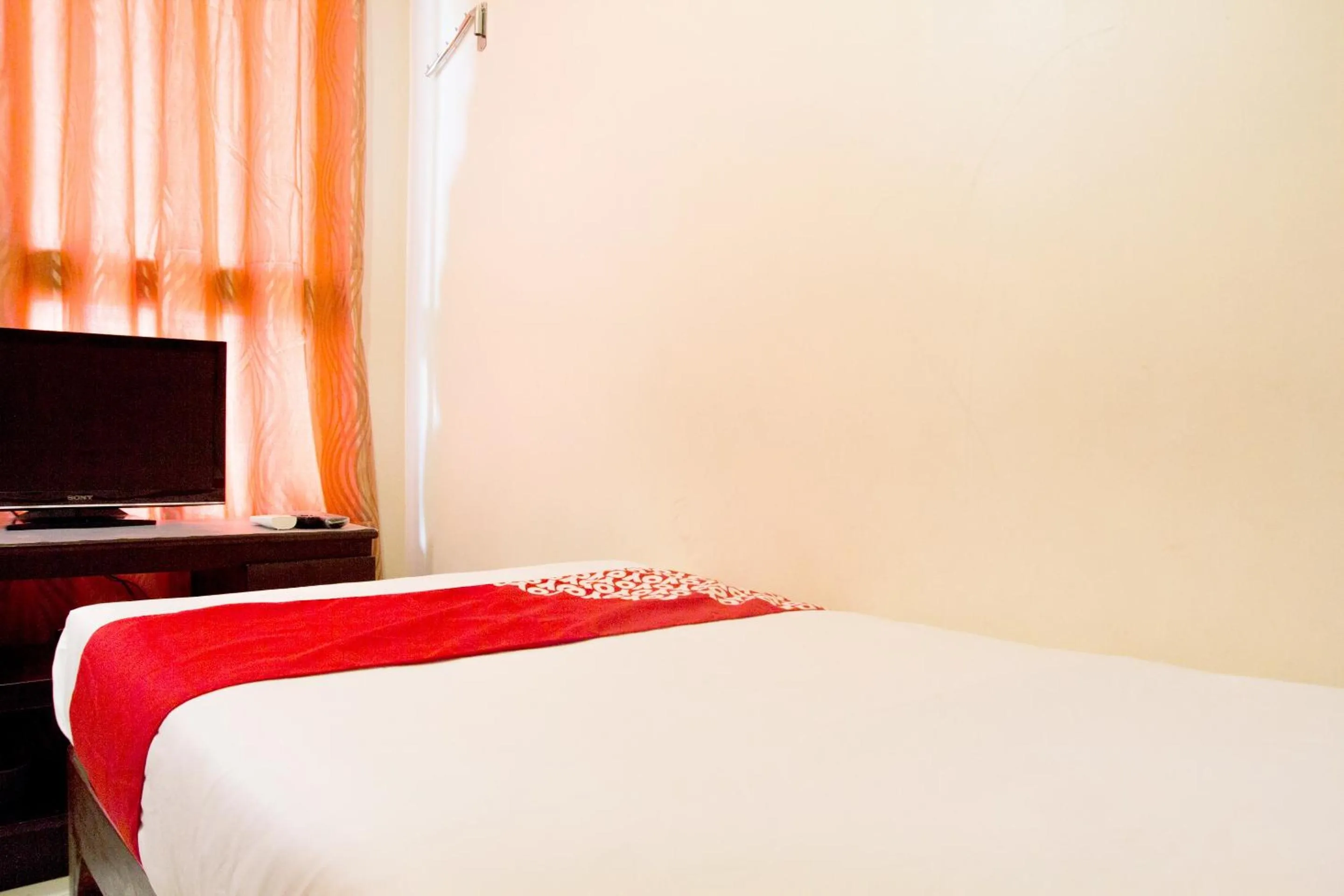 Bedroom in OYO 153 Espacio de Clarita Hometel