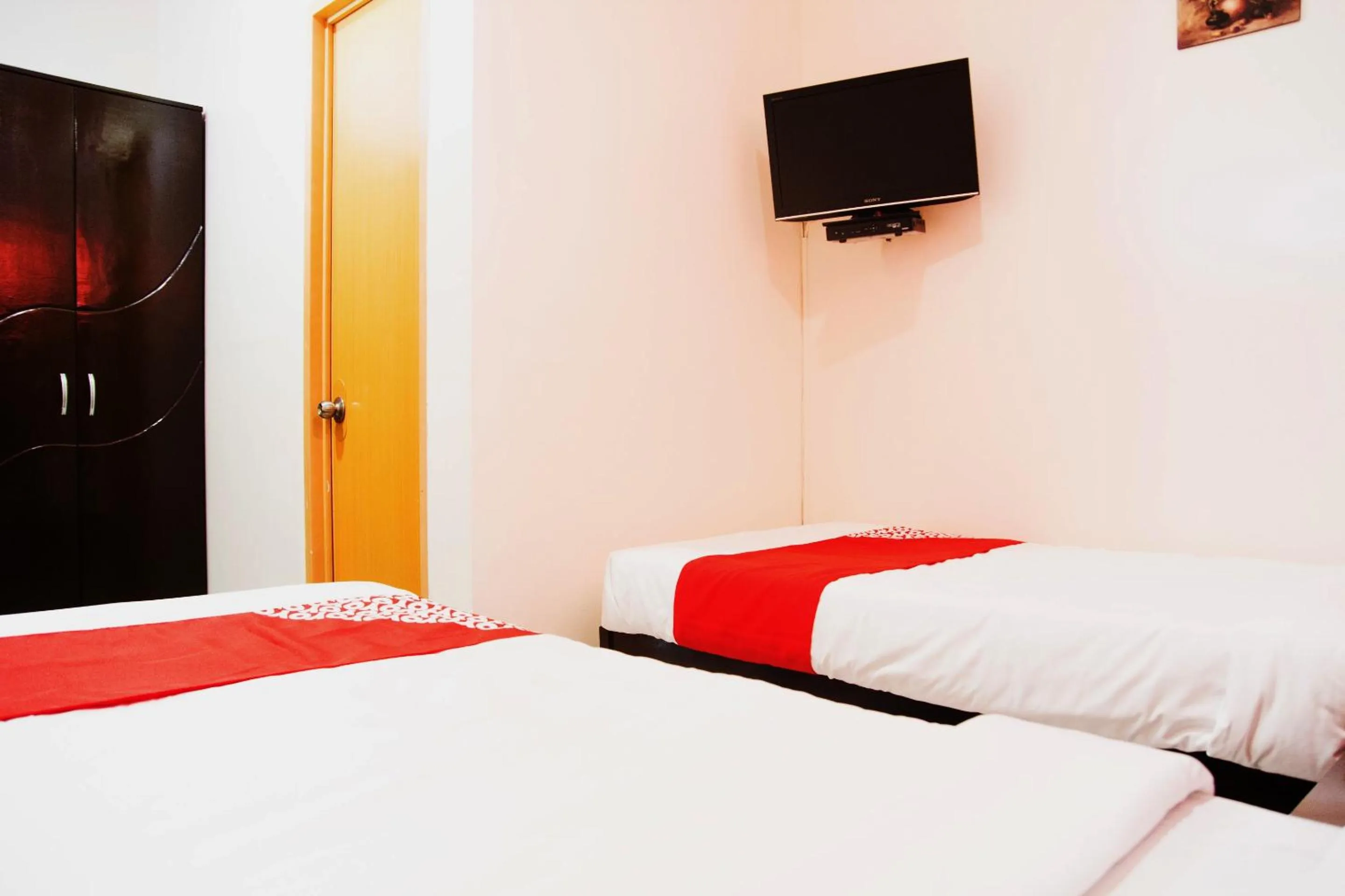 Bedroom in OYO 153 Espacio de Clarita Hometel