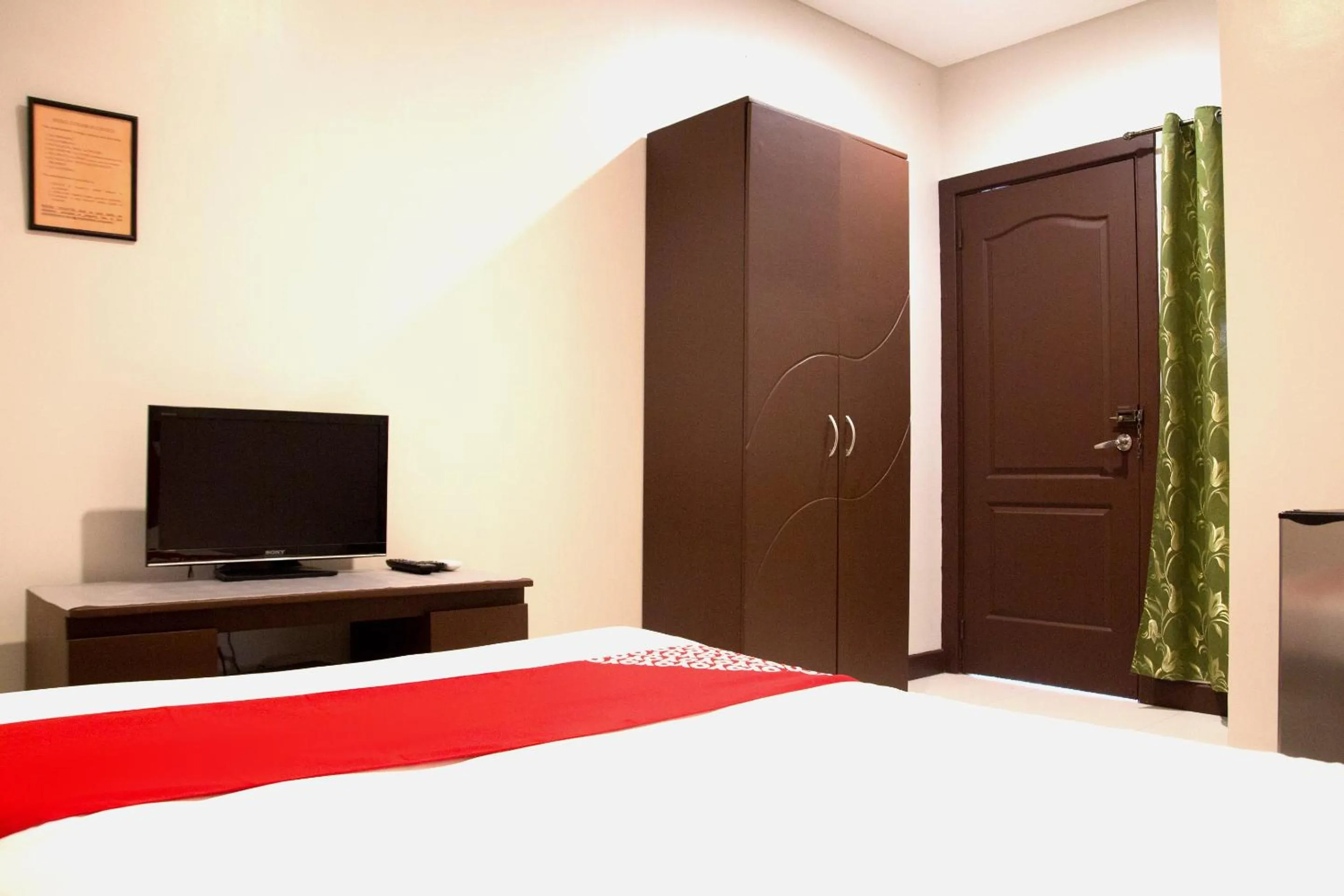 Bedroom in OYO 153 Espacio de Clarita Hometel