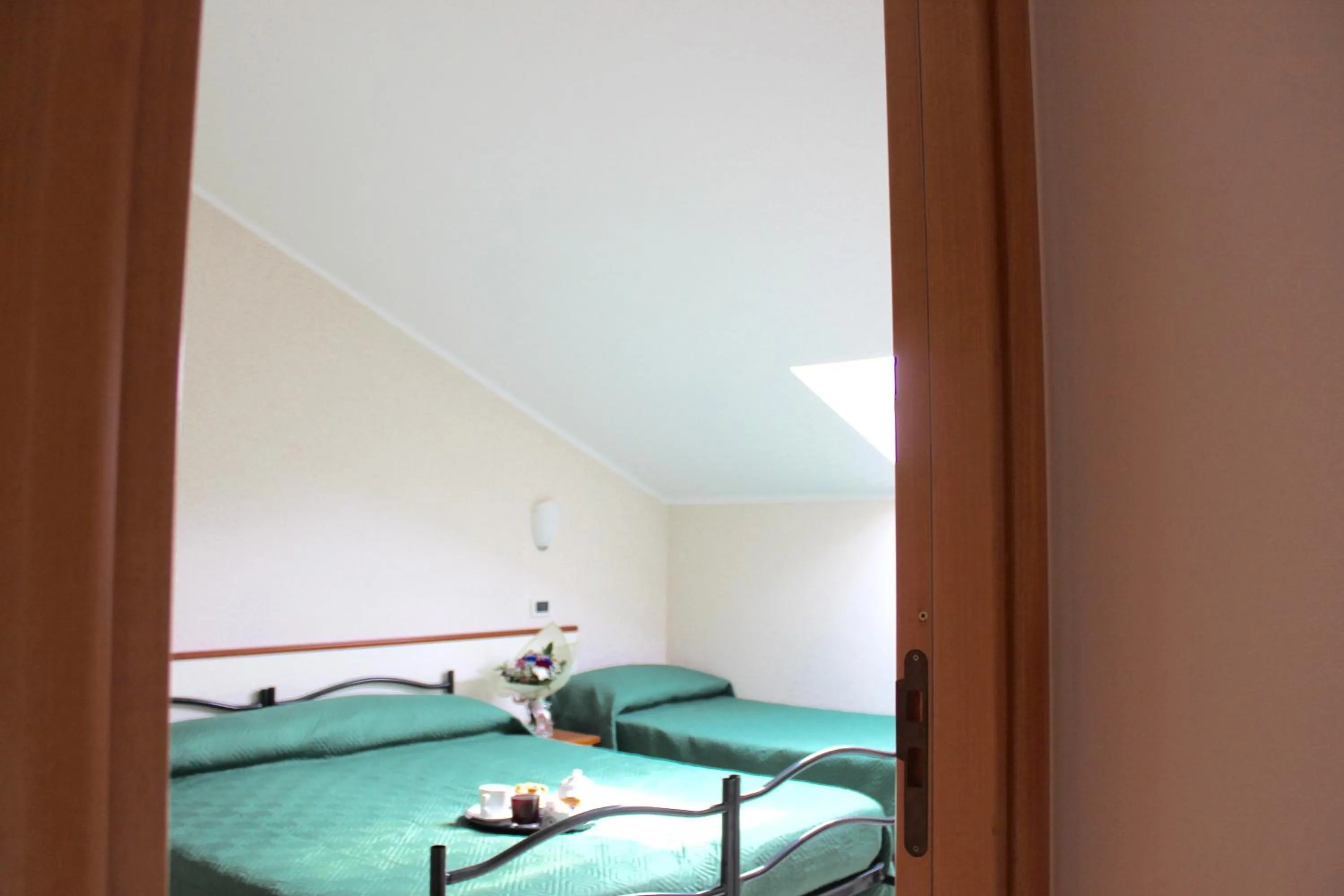 Photo of the whole room, Bed in Blue Hotel