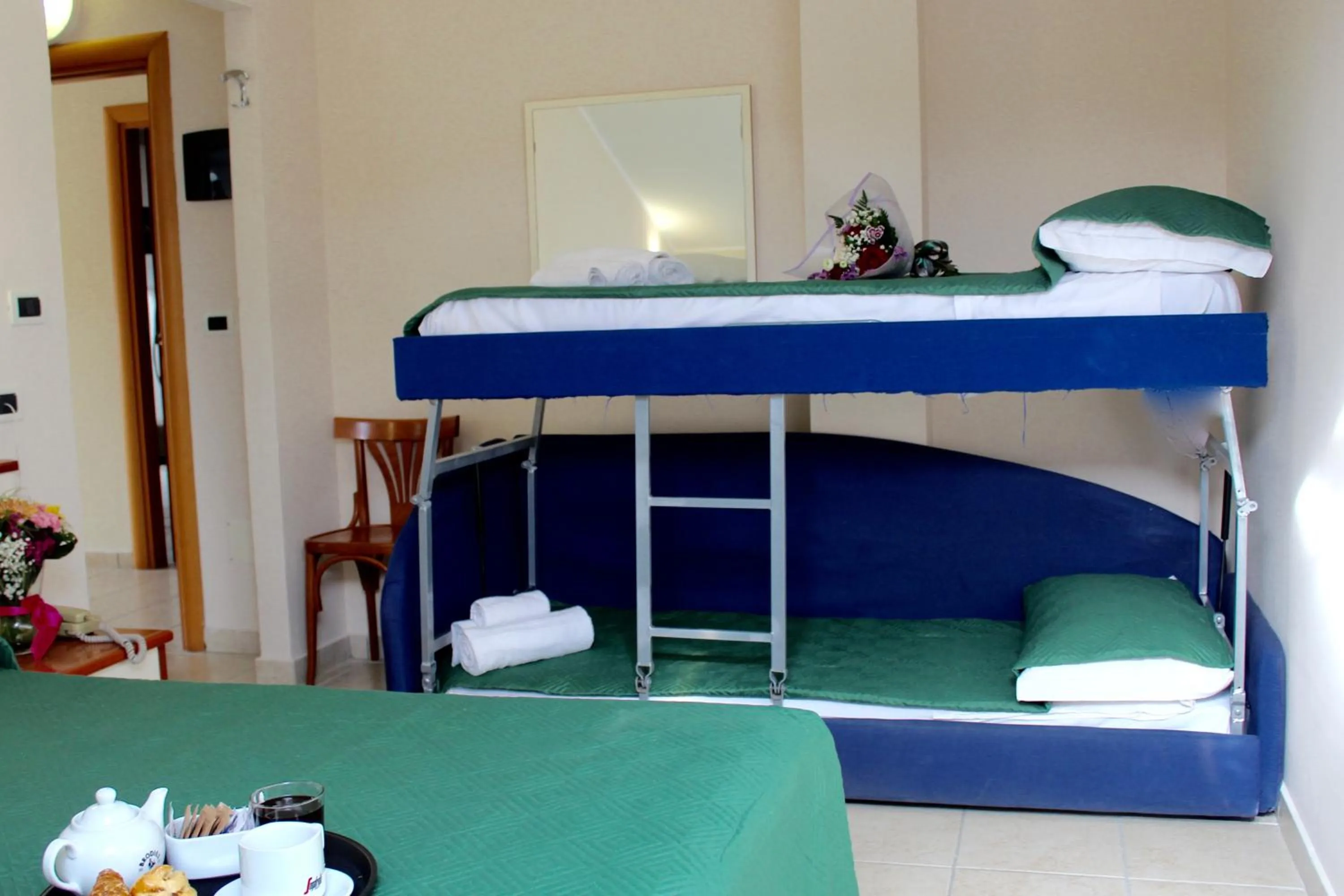 Photo of the whole room, Bed in Blue Hotel