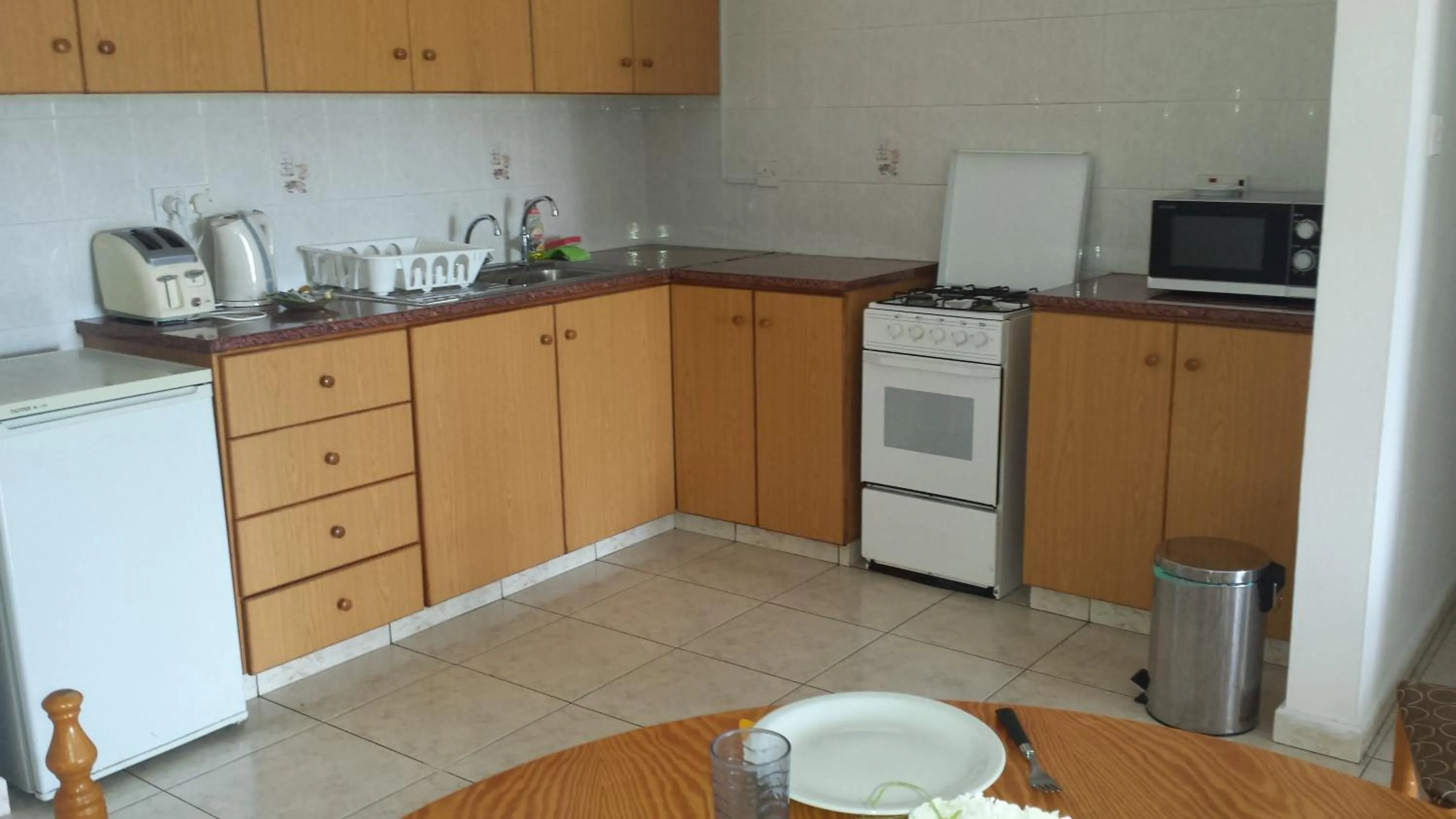 Kitchen or kitchenette in Angela Holiday Apartments