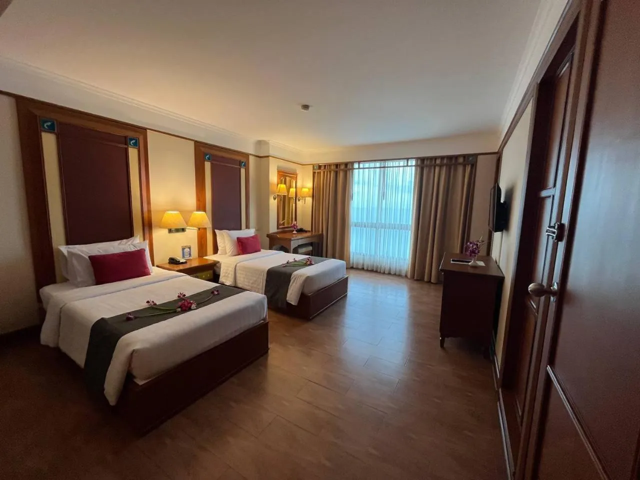 Bed in Cholchan Pattaya Beach Resort - SHA Extra Plus