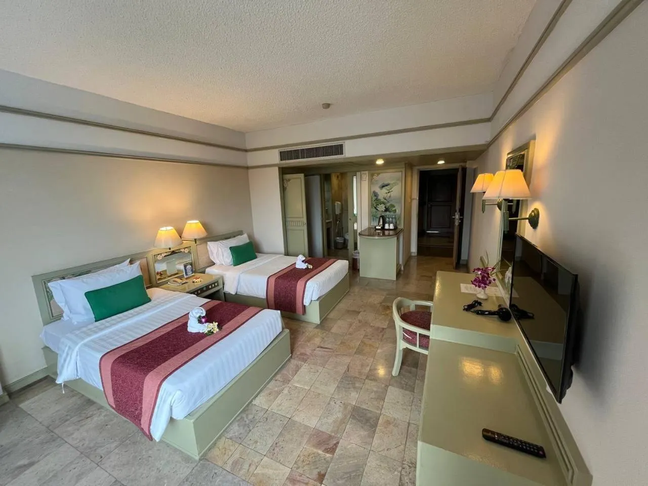 Bed in Cholchan Pattaya Beach Resort - SHA Extra Plus