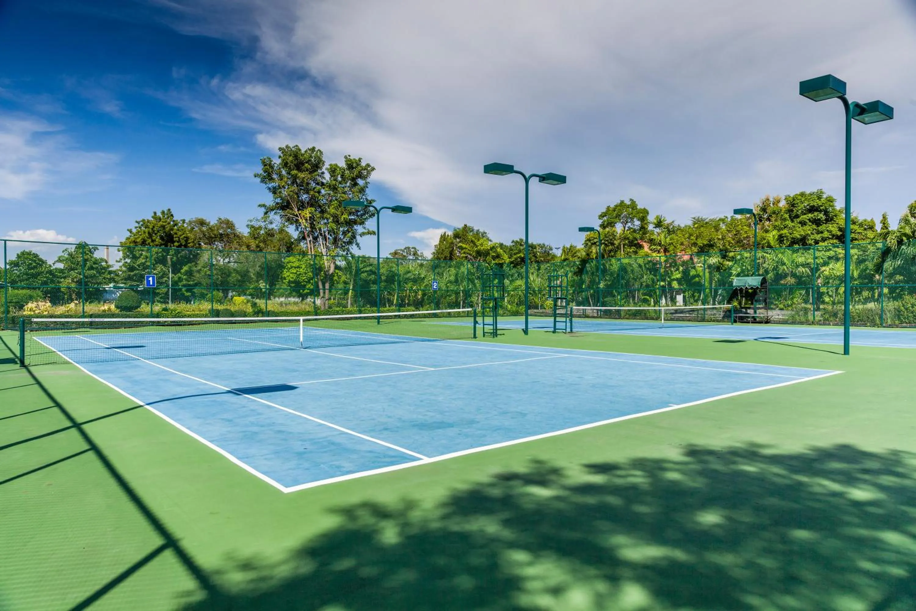Tennis court in Cholchan Pattaya Beach Resort - SHA Extra Plus