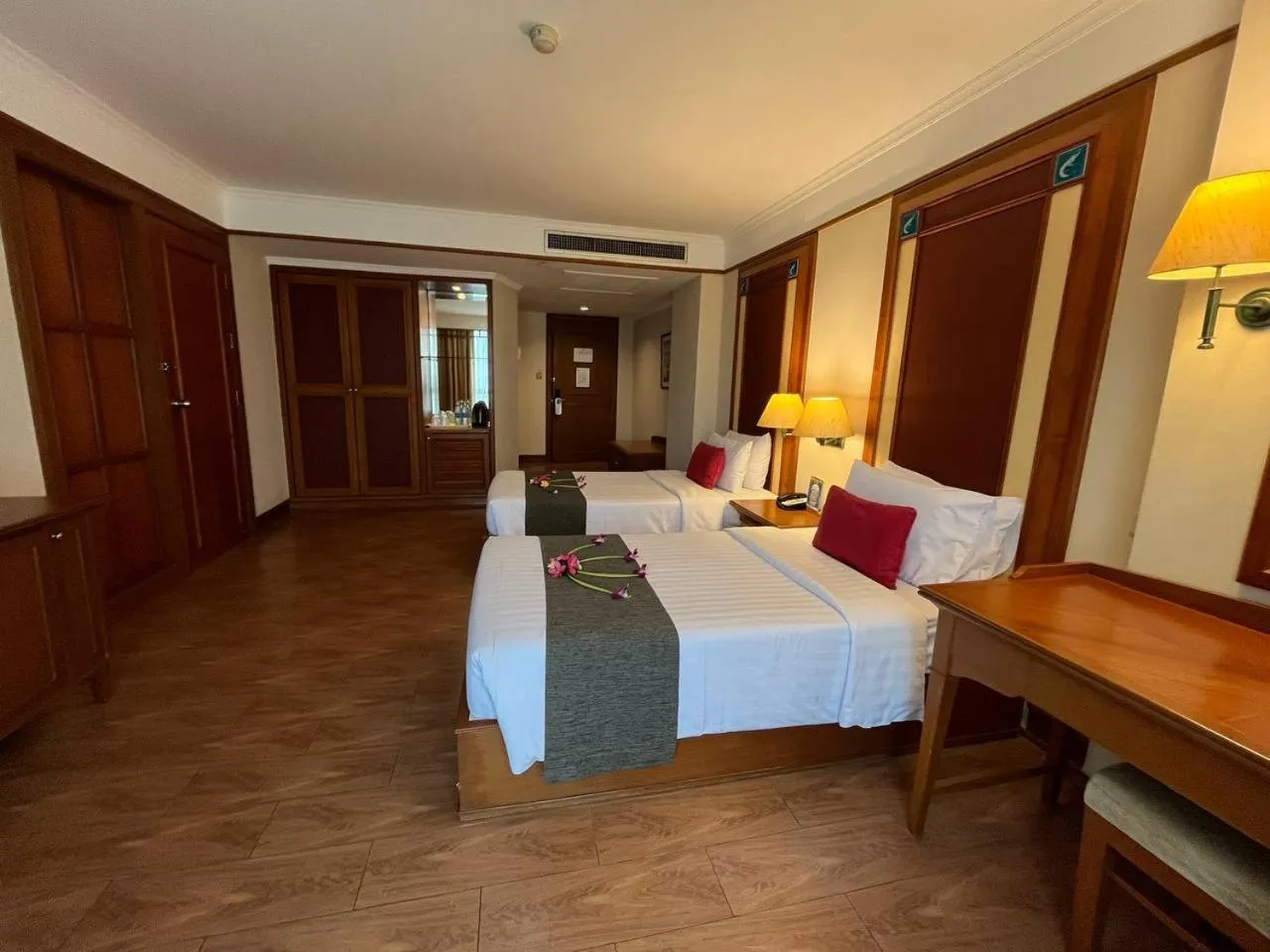 Bed in Cholchan Pattaya Beach Resort - SHA Extra Plus