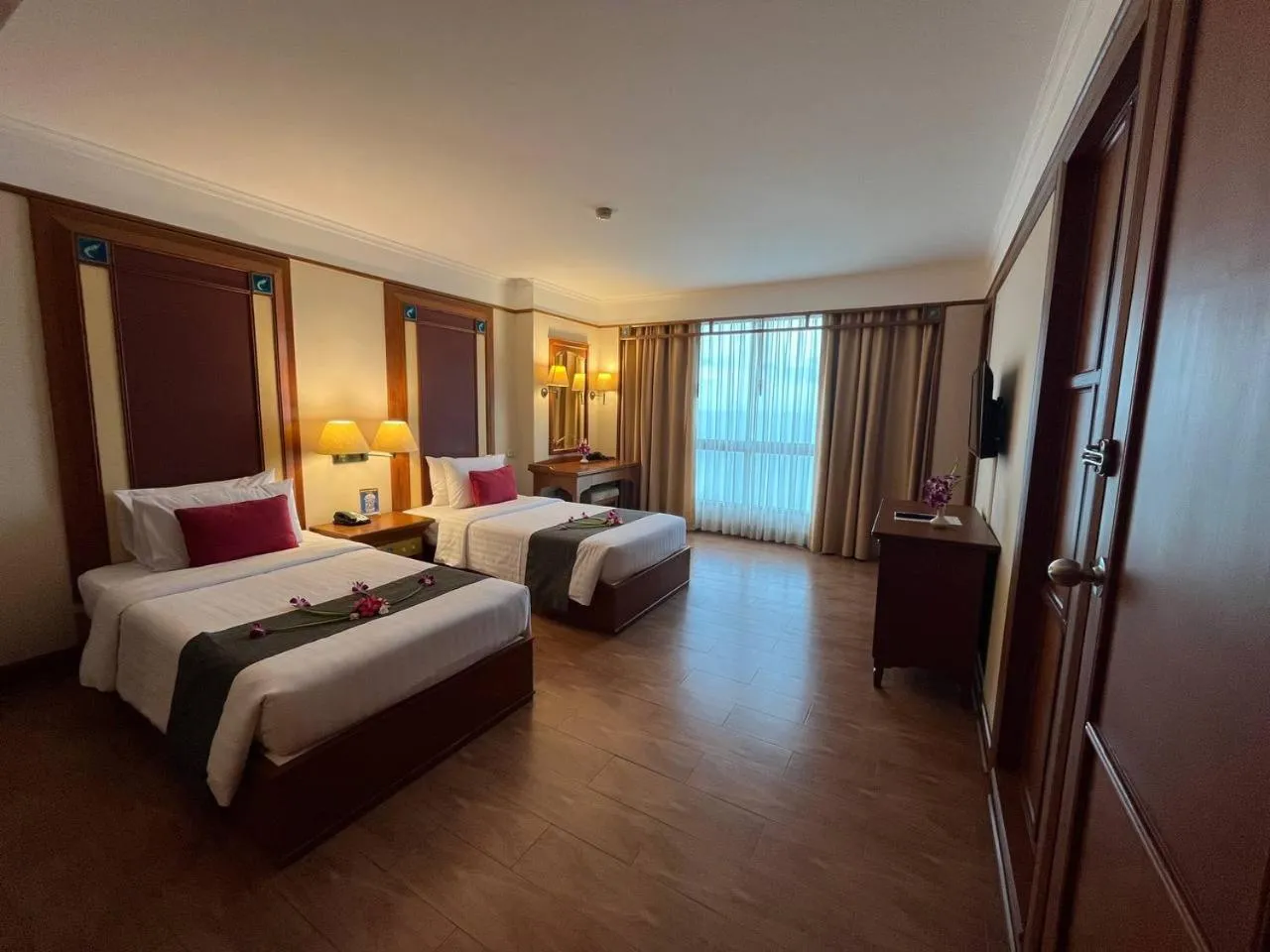 Bed in Cholchan Pattaya Beach Resort - SHA Extra Plus