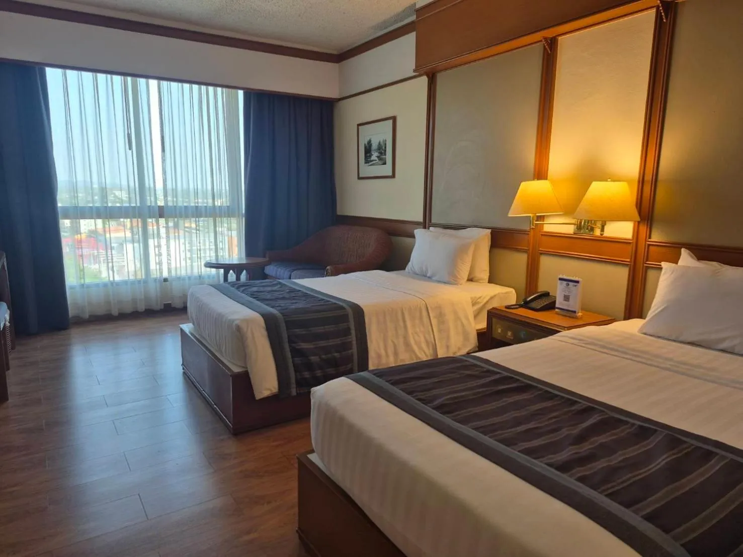 Bed in Cholchan Pattaya Beach Resort - SHA Extra Plus