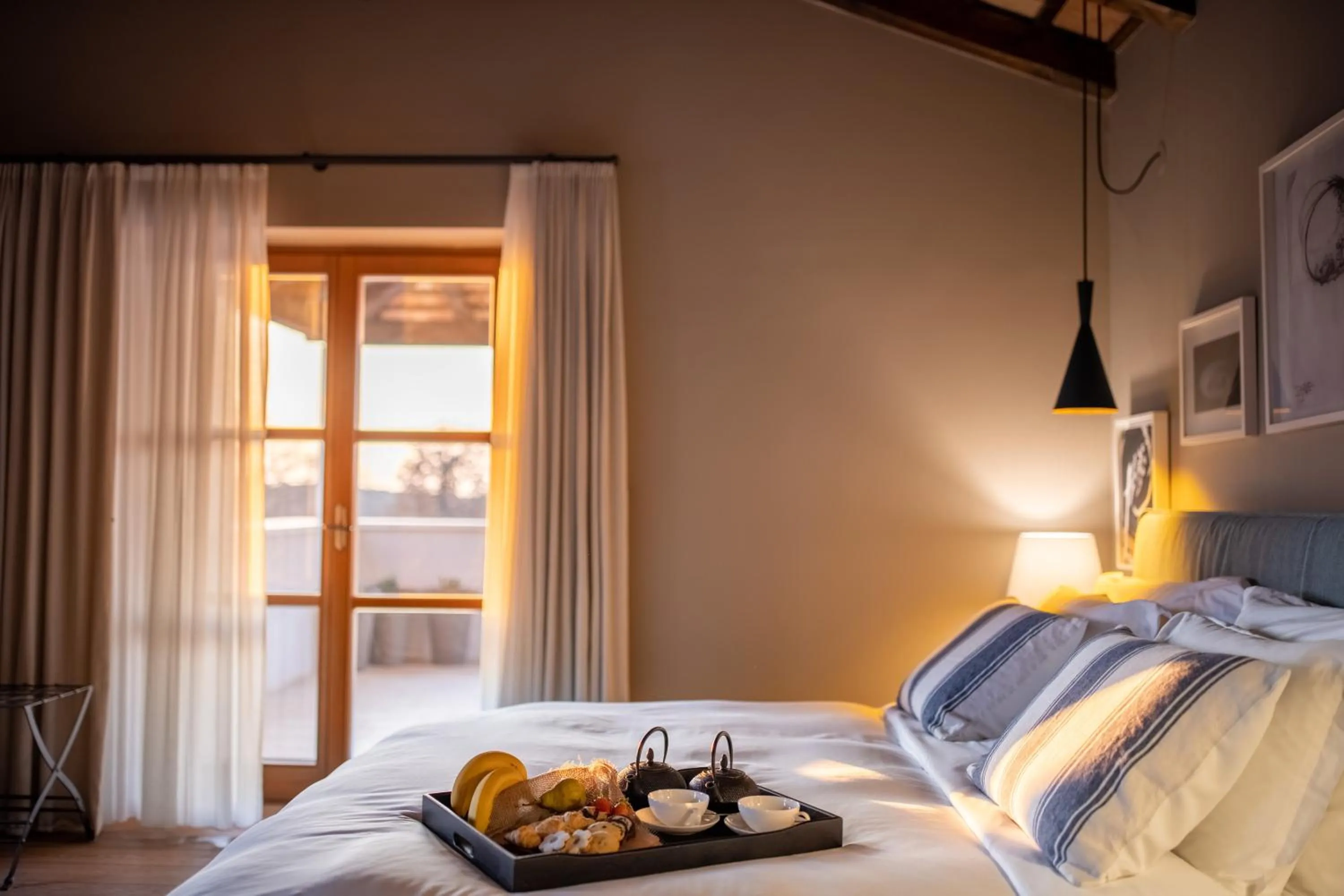 Bedroom, Bed in Meneghetti Wine Hotel and Winery - Relais & Chateaux