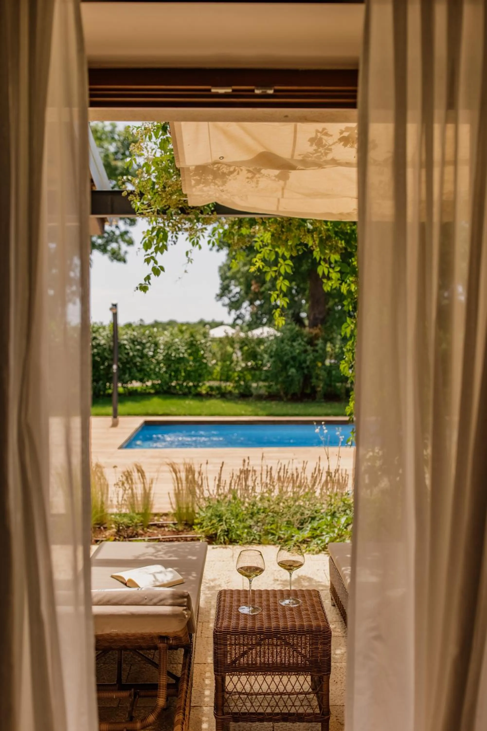 Swimming pool in Meneghetti Wine Hotel and Winery - Relais & Chateaux