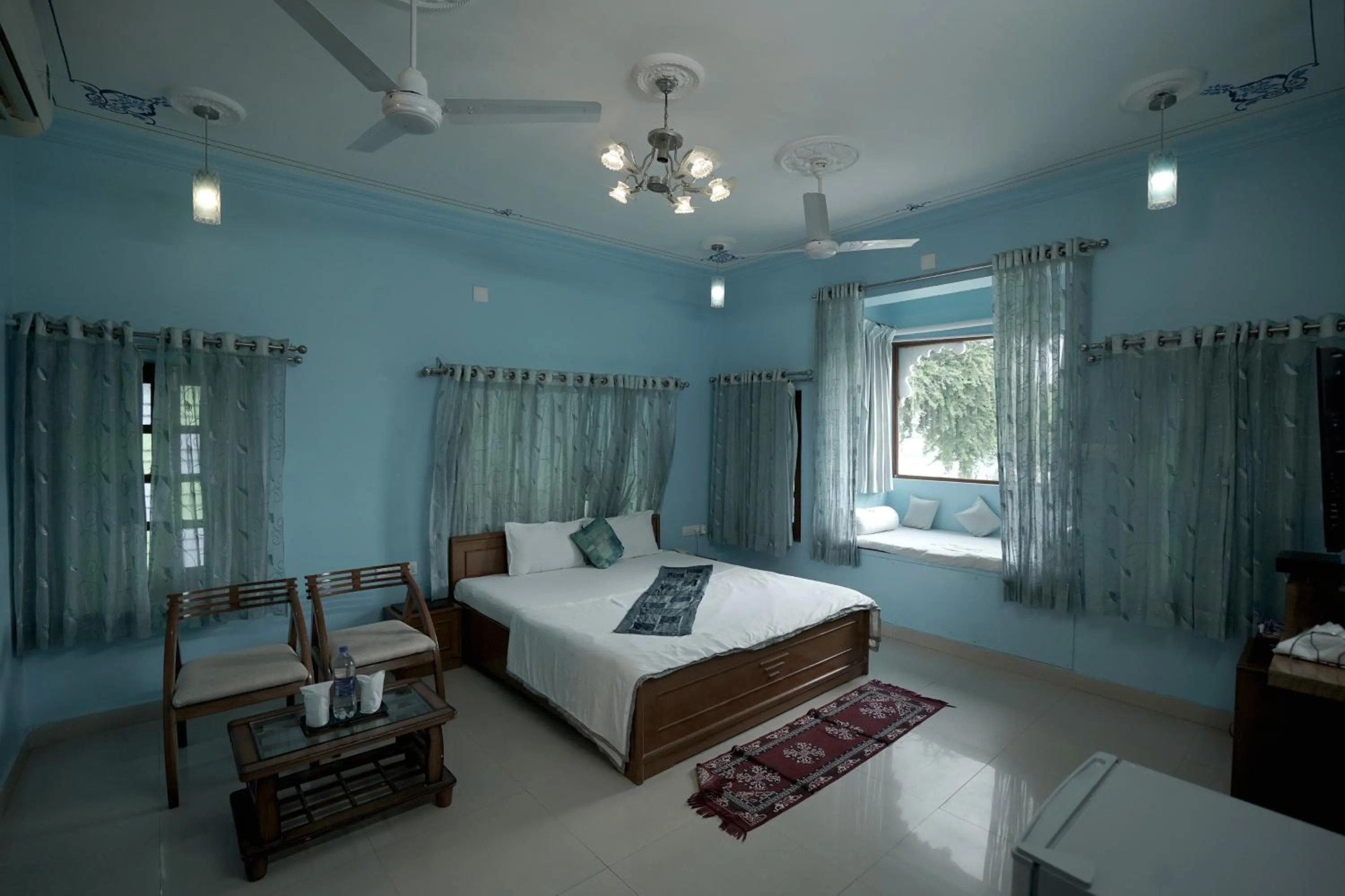 Photo of the whole room, Bed in Devendragarh Palace - Luxury Paying Guest House
